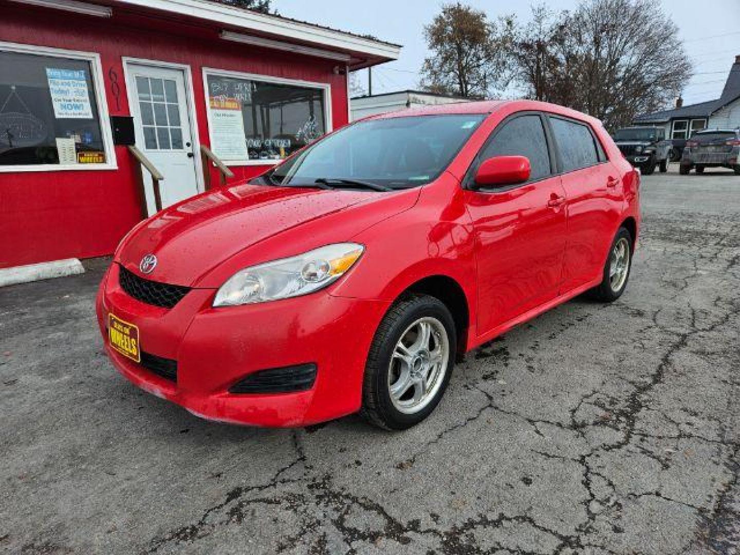 2009 Radiant Red Toyota Matrix Base 5-Speed MT (2T1KU40E09C) with an 1.8L L4 DOHC 16V engine, 5-Speed Manual transmission, located at 601 E. Idaho St., Kalispell, MT, 59901, (406) 300-4664, 0.000000, 0.000000 - Photo#0