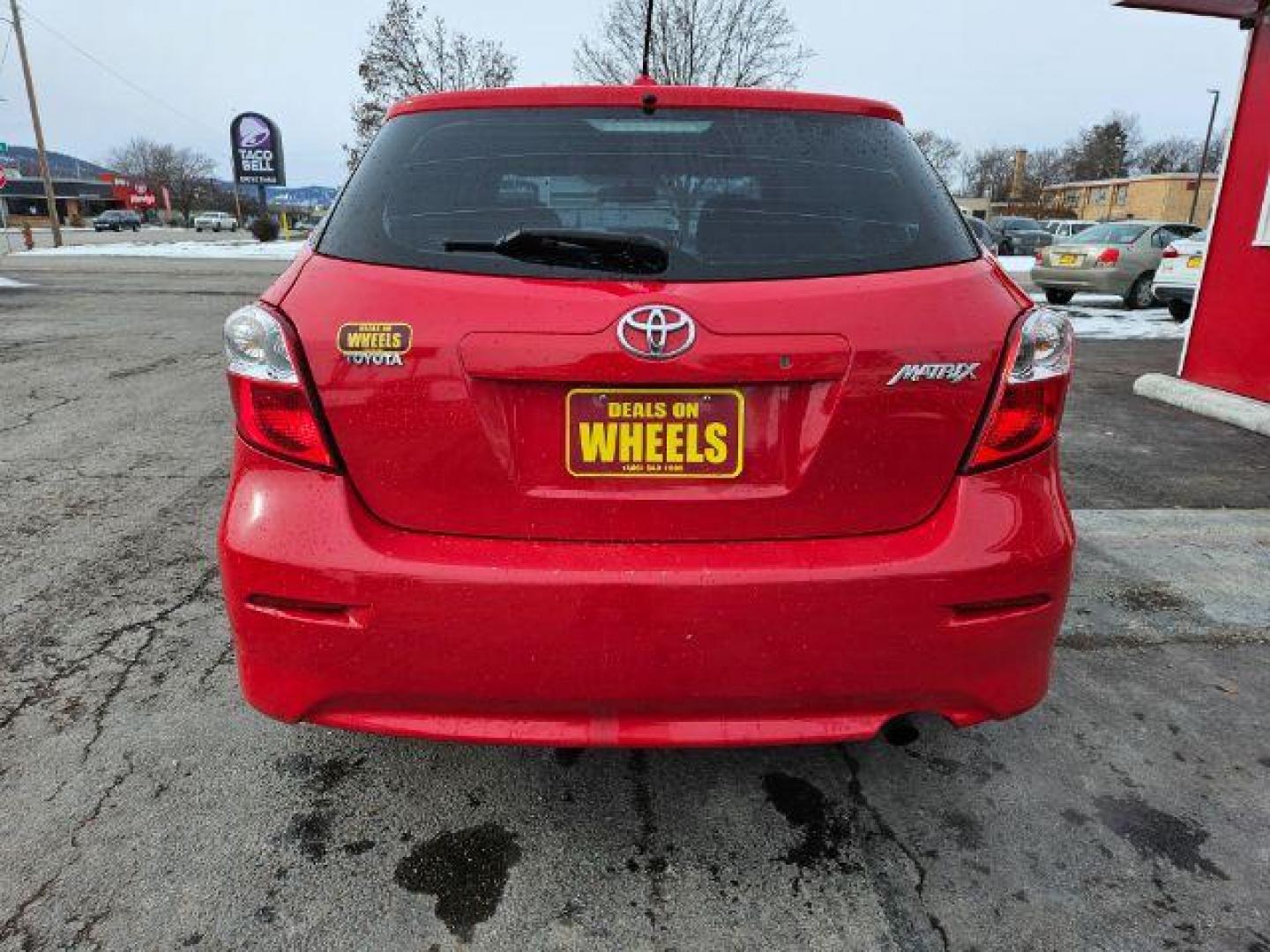 2009 Radiant Red Toyota Matrix Base 5-Speed MT (2T1KU40E09C) with an 1.8L L4 DOHC 16V engine, 5-Speed Manual transmission, located at 601 E. Idaho St., Kalispell, MT, 59901, (406) 300-4664, 0.000000, 0.000000 - Photo#3