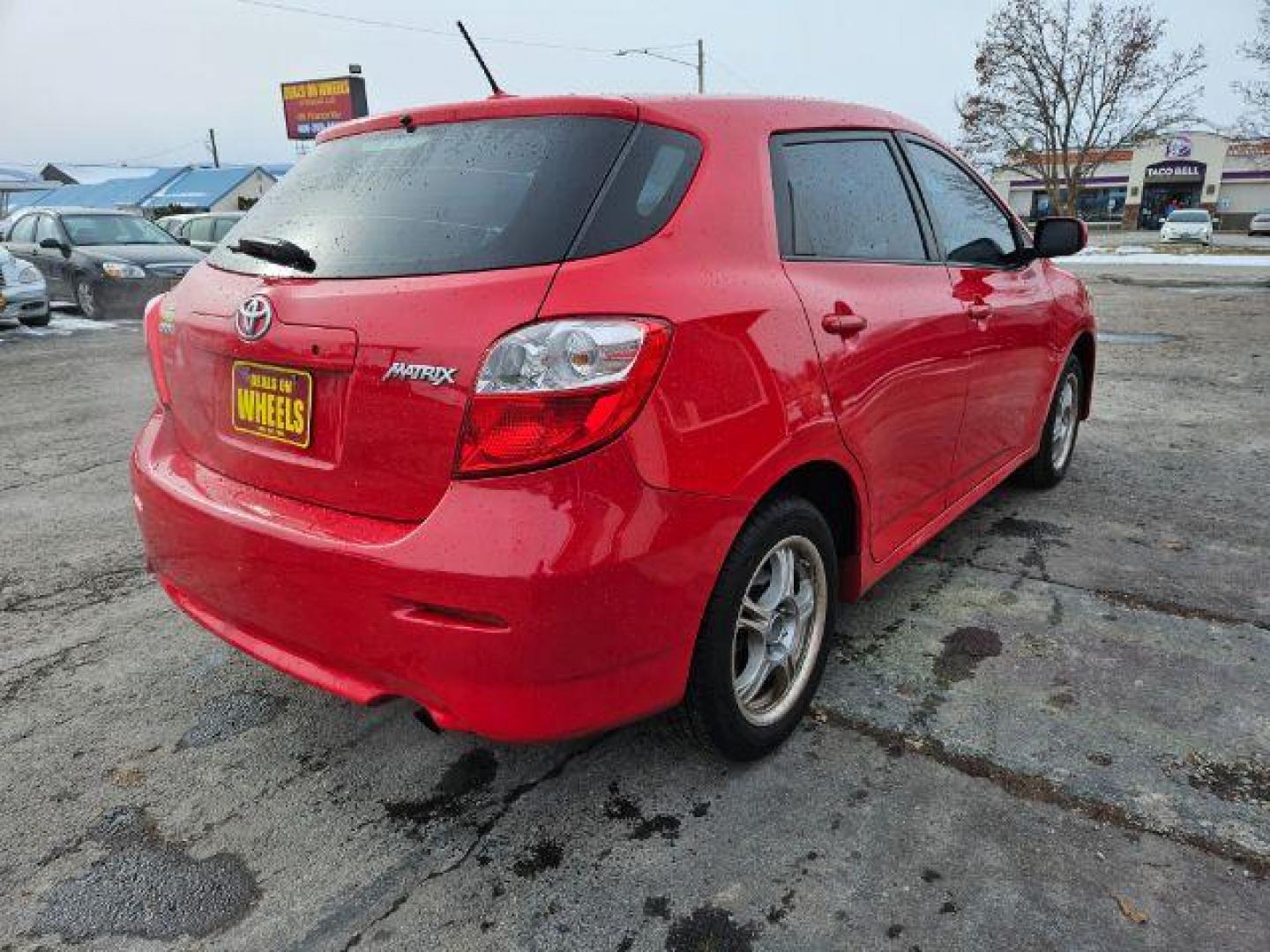 2009 Radiant Red Toyota Matrix Base 5-Speed MT (2T1KU40E09C) with an 1.8L L4 DOHC 16V engine, 5-Speed Manual transmission, located at 601 E. Idaho St., Kalispell, MT, 59901, (406) 300-4664, 0.000000, 0.000000 - Photo#4