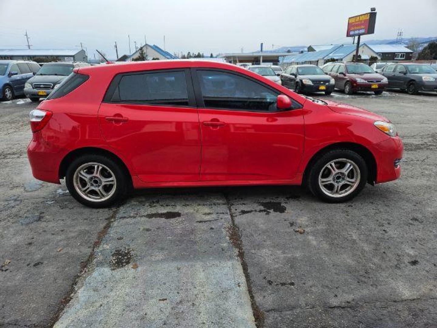 2009 Radiant Red Toyota Matrix Base 5-Speed MT (2T1KU40E09C) with an 1.8L L4 DOHC 16V engine, 5-Speed Manual transmission, located at 601 E. Idaho St., Kalispell, MT, 59901, (406) 300-4664, 0.000000, 0.000000 - Photo#5