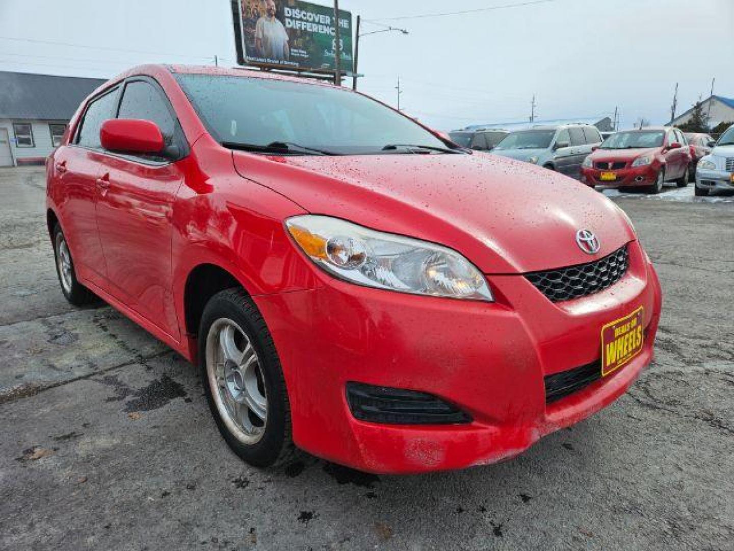 2009 Radiant Red Toyota Matrix Base 5-Speed MT (2T1KU40E09C) with an 1.8L L4 DOHC 16V engine, 5-Speed Manual transmission, located at 601 E. Idaho St., Kalispell, MT, 59901, (406) 300-4664, 0.000000, 0.000000 - Photo#6