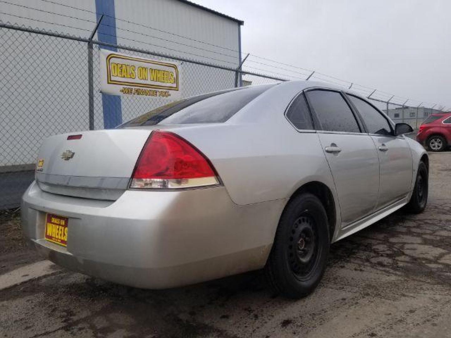 2010 Silver Ice Metallic Chevrolet Impala LS (2G1WA5EN0A1) with an 3.5L V6 OHV 16V engine, 4-Speed Automatic transmission, located at 1800 West Broadway, Missoula, 59808, (406) 543-1986, 46.881348, -114.023628 - Photo#4