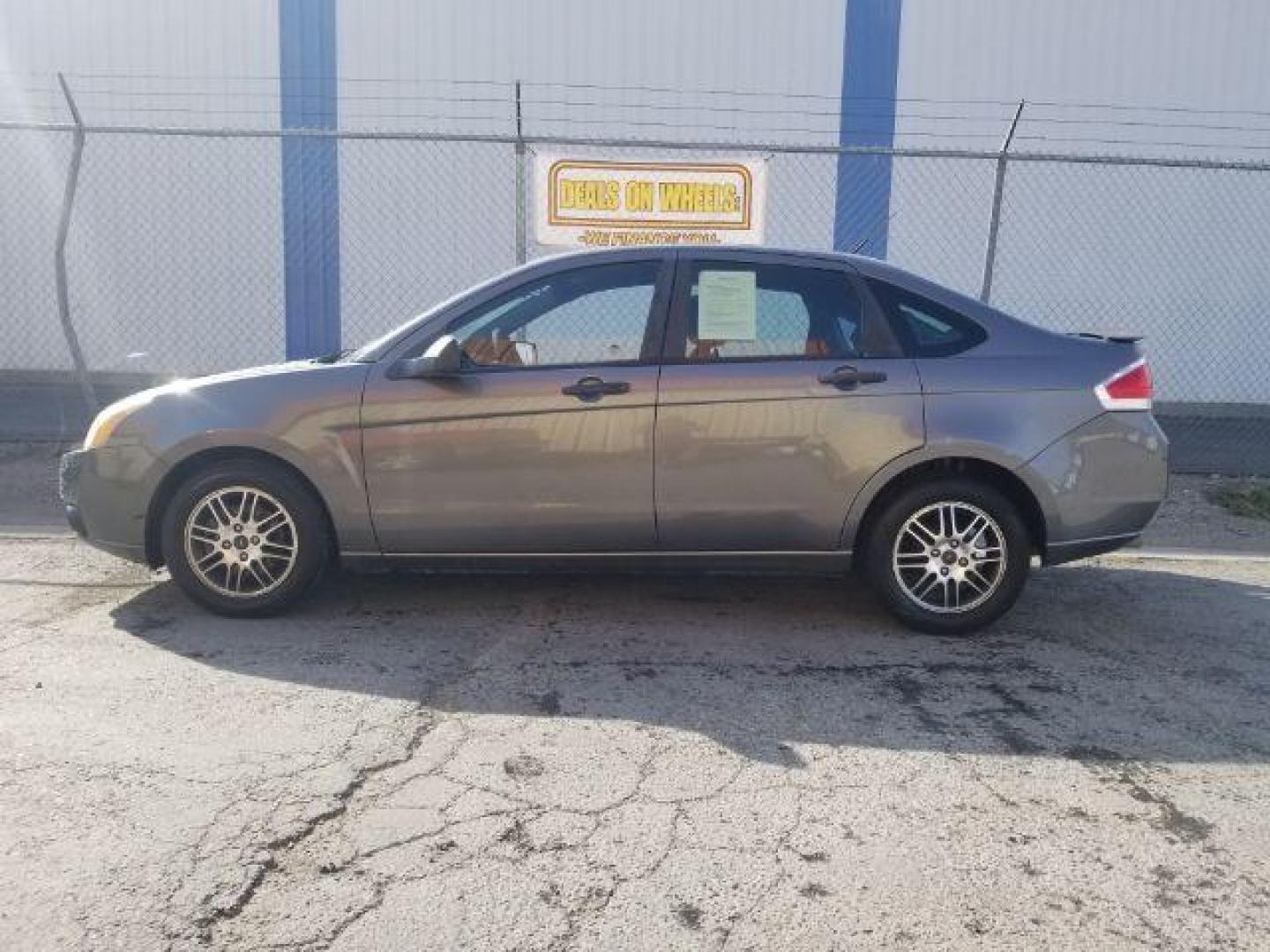 2010 Ford Focus SE Sedan (1FAHP3FNXAW) with an 2.0L L4 DOHC 16V engine, located at 4047 Montana Ave., Billings, MT, 59101, 45.770847, -108.529800 - Photo#6