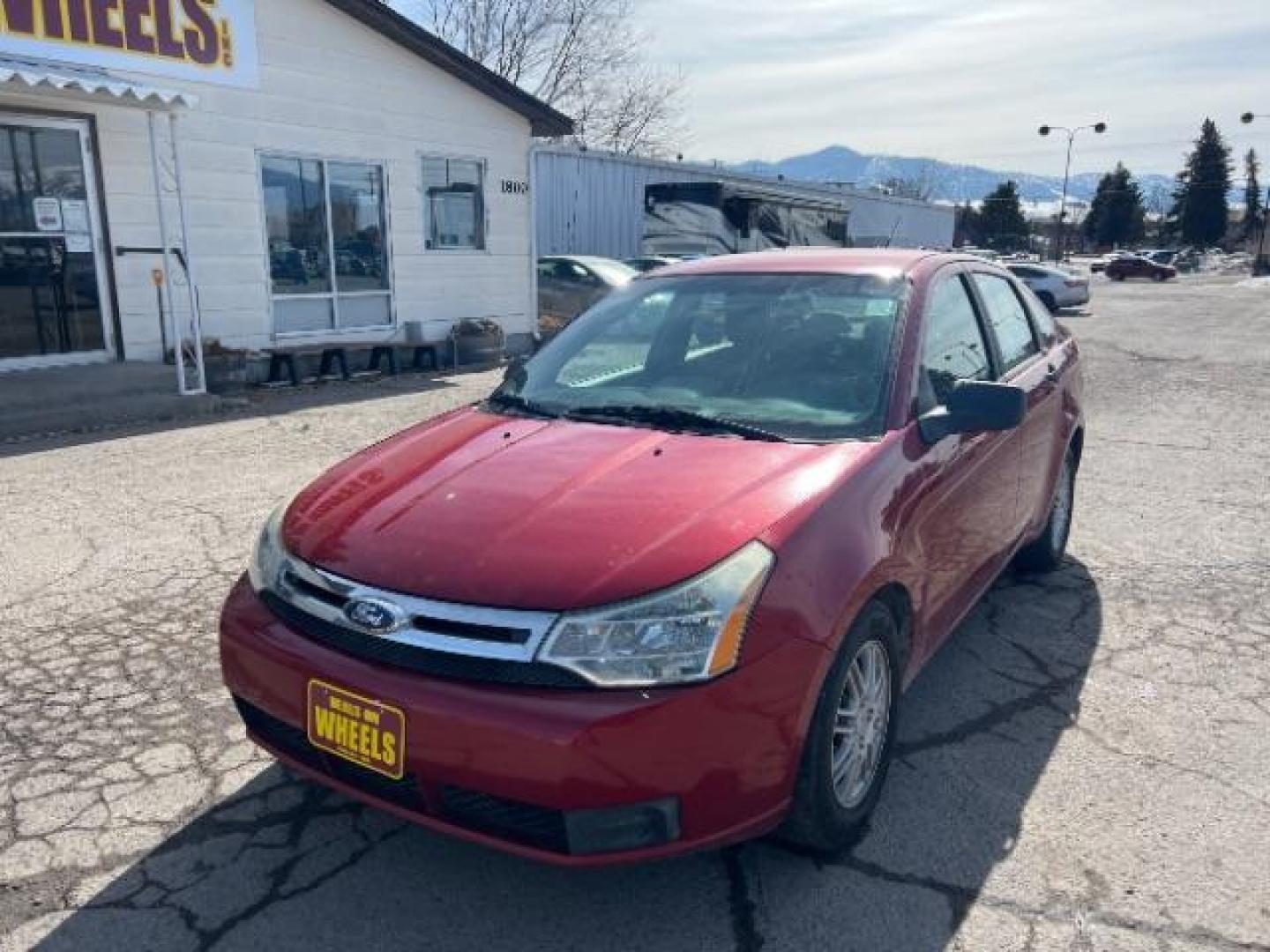 2010 Ford Focus SE Sedan (1FAHP3FN0AW) with an 2.0L L4 DOHC 16V engine, located at 4047 Montana Ave., Billings, MT, 59101, 45.770847, -108.529800 - Photo#0