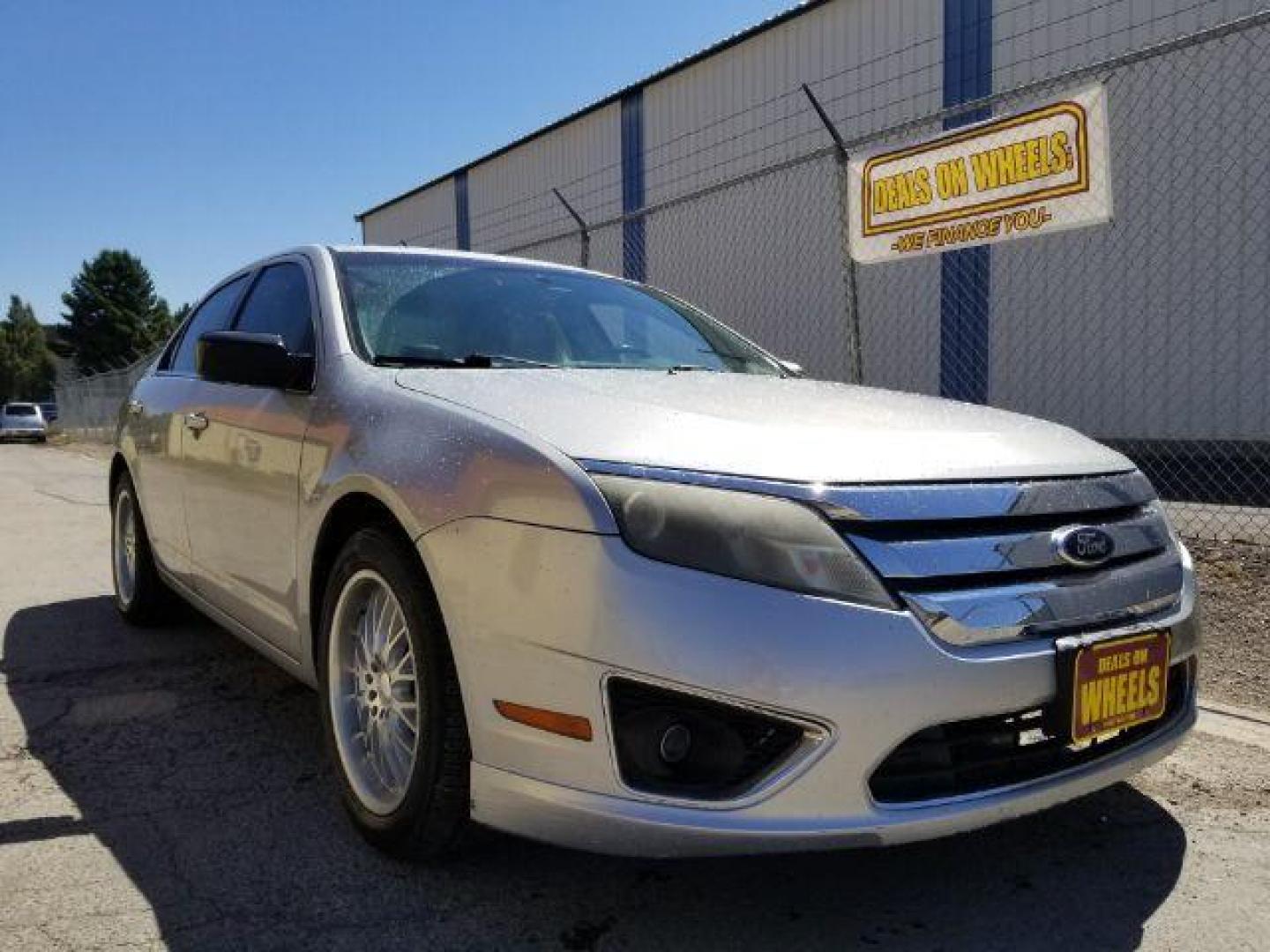 2010 Ford Fusion V6 SEL AWD (3FAHP0CG4AR) with an 3.0L V6 DOHC 24V engine, located at 4047 Montana Ave., Billings, MT, 59101, 45.770847, -108.529800 - Photo#6