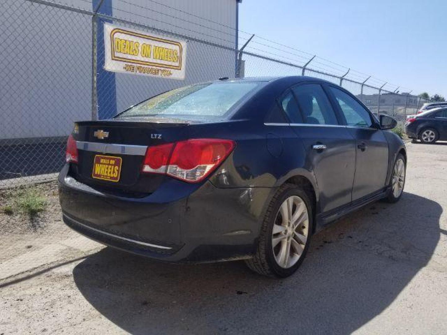 2011 Chevrolet Cruze LTZ (1G1PH5S98B7) with an 1.4L L4 DOHC 16V TURBO engine, 6-Speed Automatic transmission, located at 1800 West Broadway, Missoula, 59808, (406) 543-1986, 46.881348, -114.023628 - Photo#4