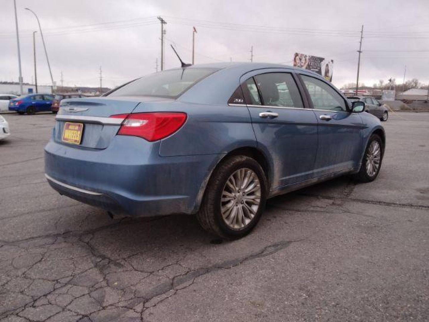 2011 Chrysler 200 Limited (1C3BC2FG4BN) with an 3.6L V6 DOHC 24V FFV engine, 6-Speed Automatic transmission, located at 4047 Montana Ave., Billings, MT, 59101, 45.770847, -108.529800 - Photo#4