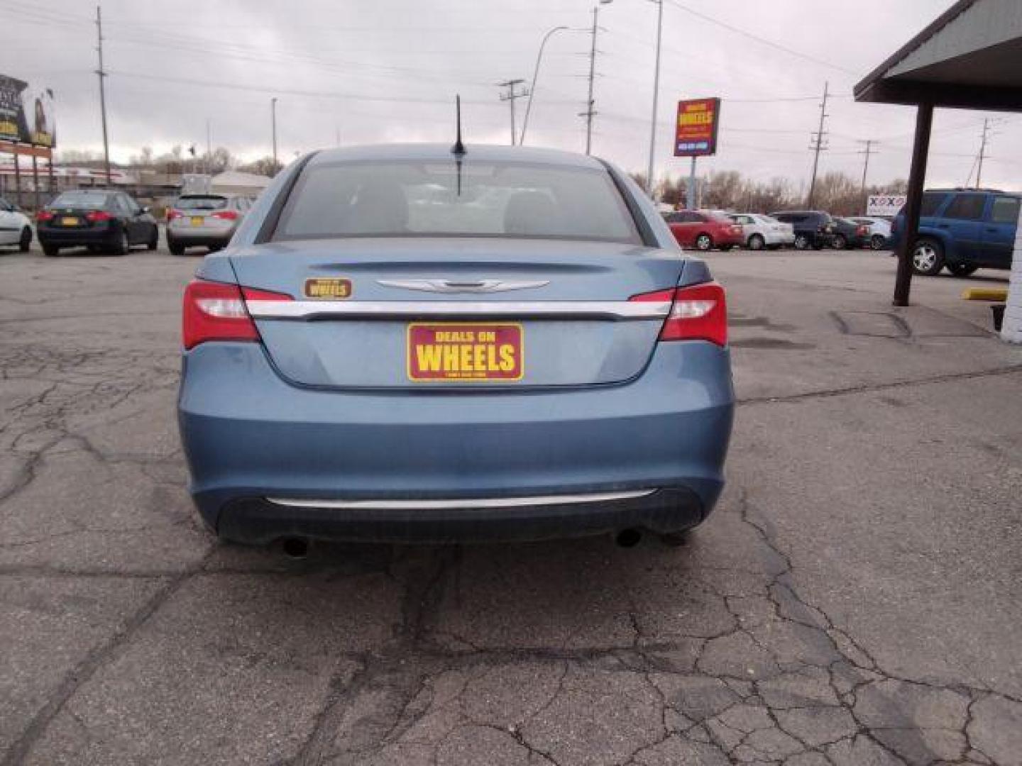 2011 Chrysler 200 Limited (1C3BC2FG4BN) with an 3.6L V6 DOHC 24V FFV engine, 6-Speed Automatic transmission, located at 4047 Montana Ave., Billings, MT, 59101, 45.770847, -108.529800 - Photo#5