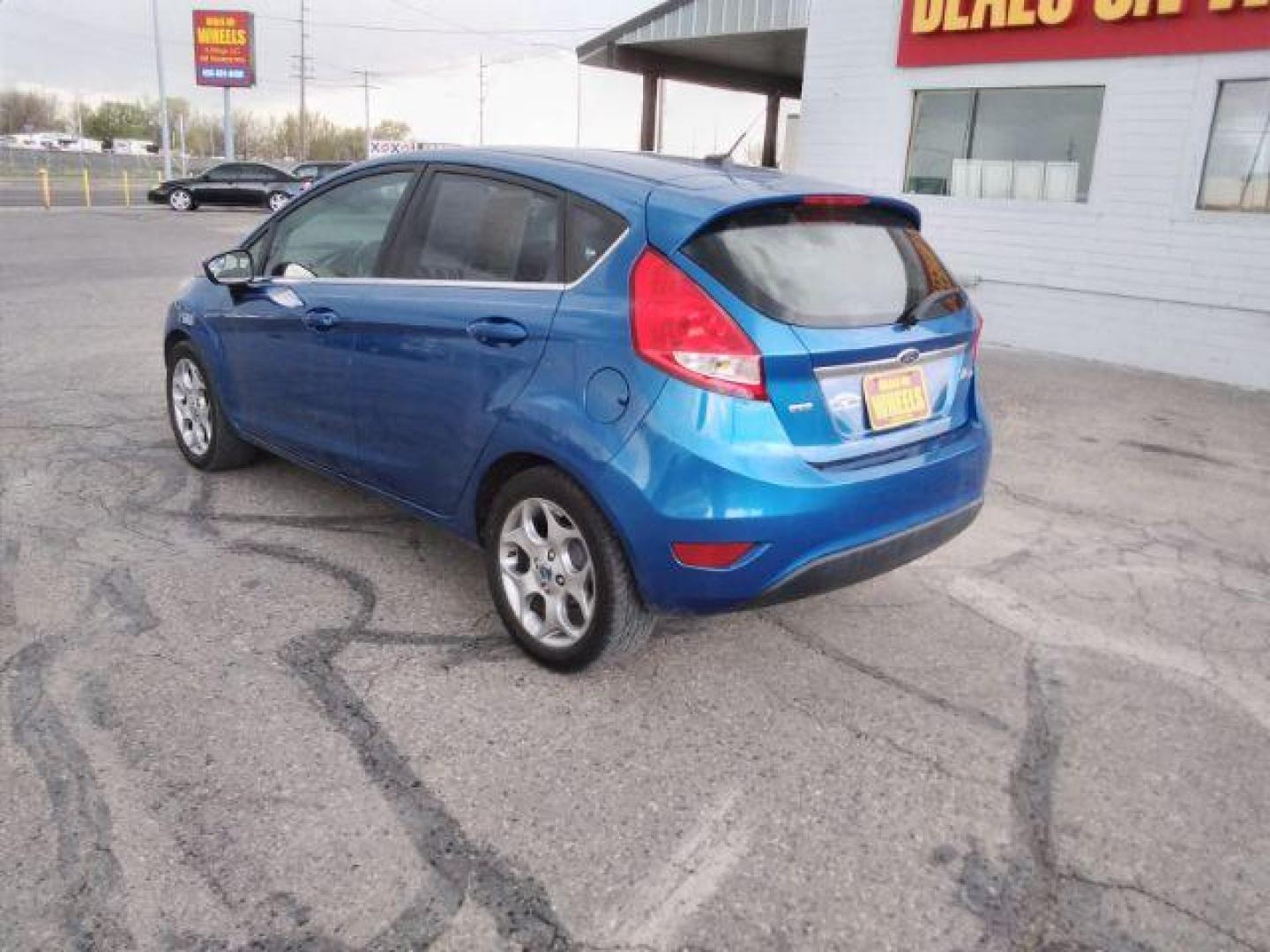 2011 Ford Fiesta SES Hatchback (3FADP4FJ6BM) with an 1.6L L4 DOHC 16V engine, located at 4047 Montana Ave., Billings, MT, 59101, 45.770847, -108.529800 - Photo#3