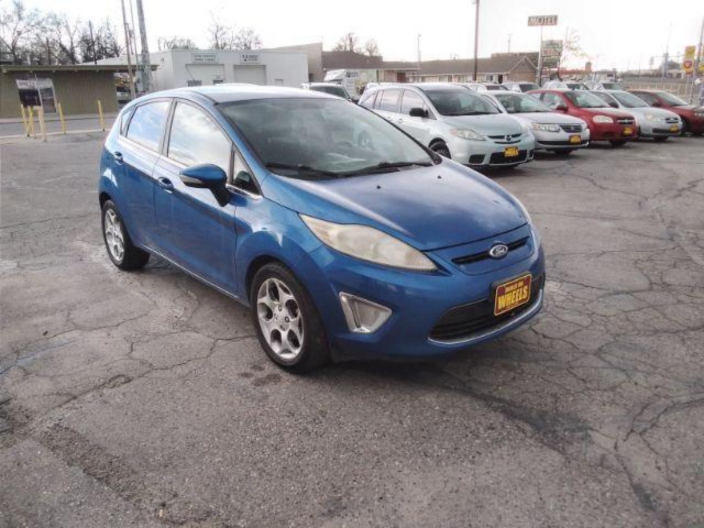 2011 Ford Fiesta SES Hatchback (3FADP4FJ6BM) with an 1.6L L4 DOHC 16V engine, located at 4047 Montana Ave., Billings, MT, 59101, 45.770847, -108.529800 - Photo#4