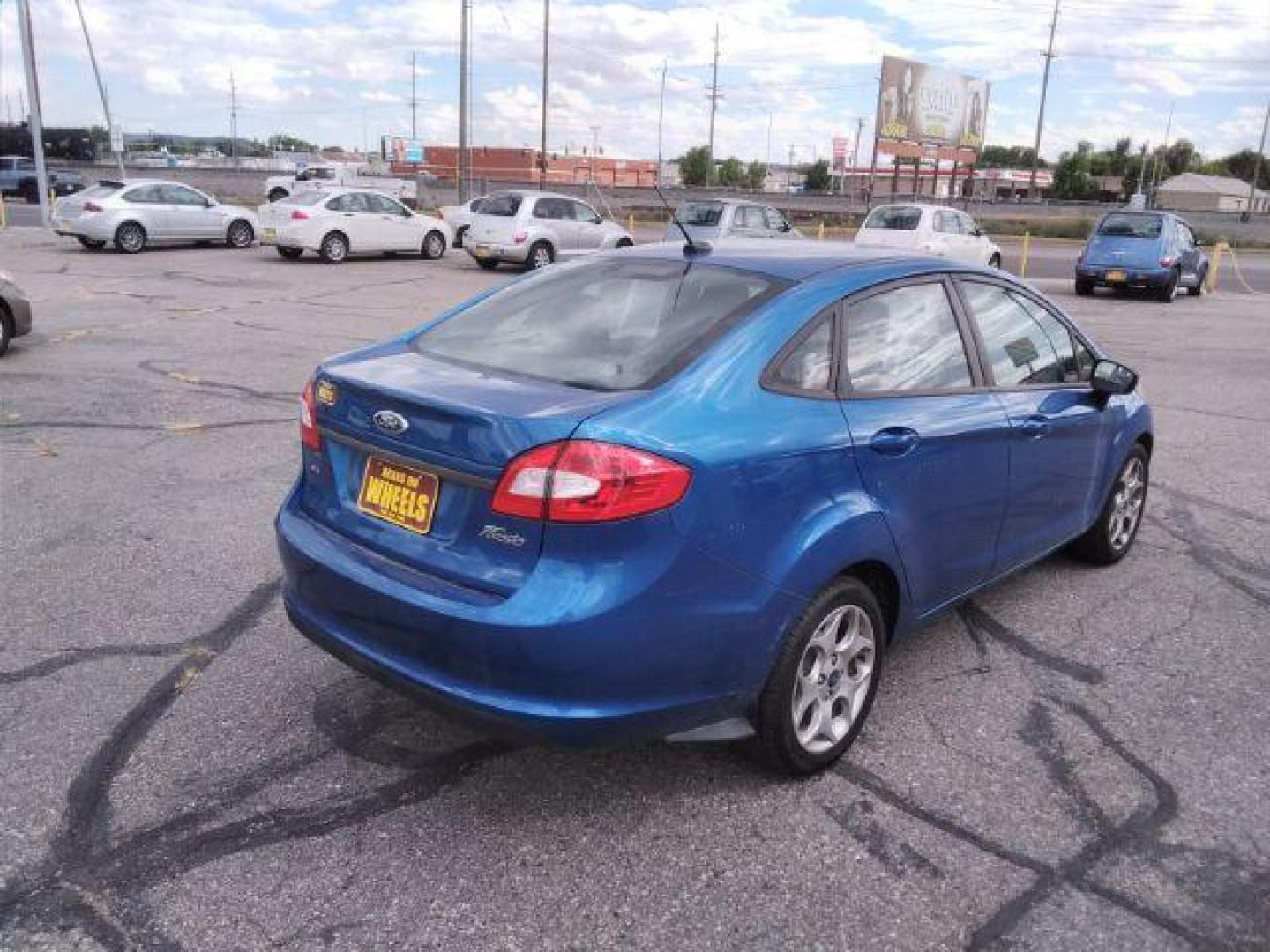 2011 Ford Fiesta SEL Sedan (3FADP4CJ7BM) with an 1.6L L4 DOHC 16V engine, located at 4047 Montana Ave., Billings, MT, 59101, 45.770847, -108.529800 - Photo#4