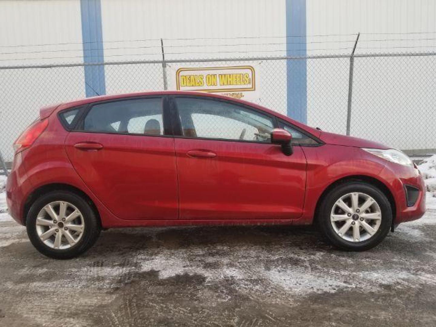 2011 Ford Fiesta SE Hatchback (3FADP4EJ1BM) with an 1.6L L4 DOHC 16V engine, located at 4047 Montana Ave., Billings, MT, 59101, 45.770847, -108.529800 - Photo#3