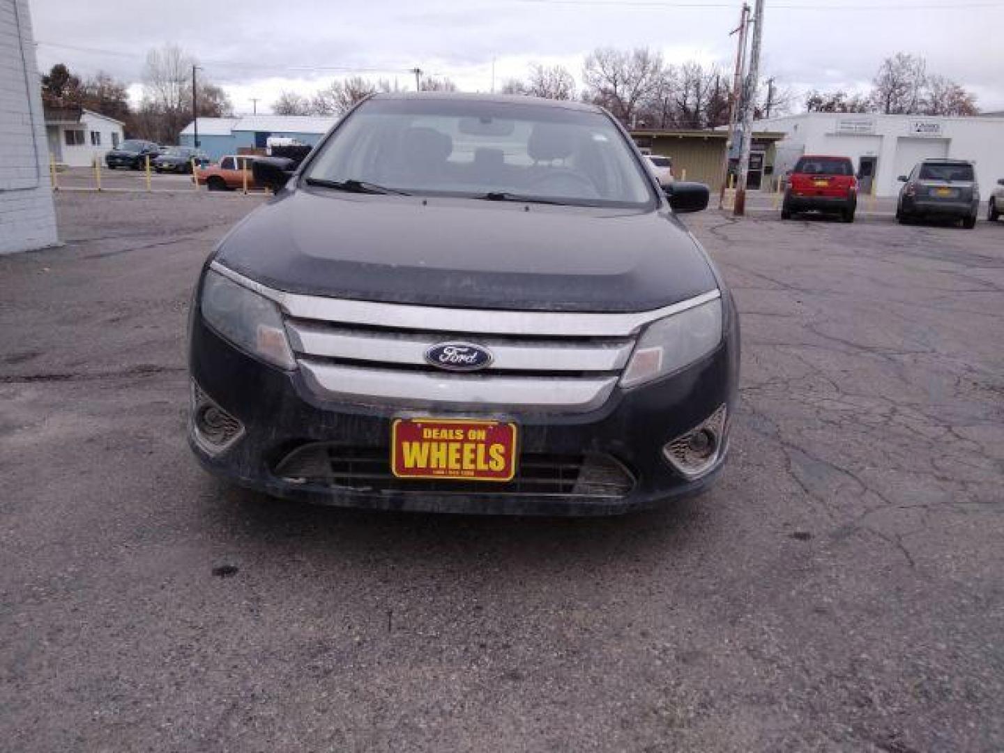 2011 Ford Fusion I4 SEL (3FAHP0JA5BR) with an 2.5L L4 DOHC 16V engine, located at 4047 Montana Ave., Billings, MT, 59101, 45.770847, -108.529800 - Photo#2