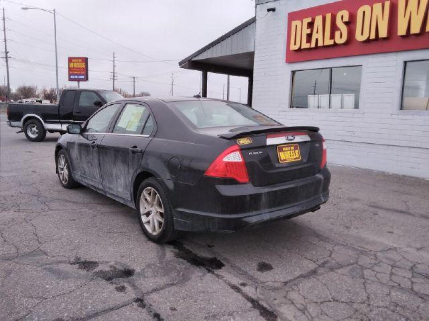 2011 Ford Fusion I4 SEL (3FAHP0JA5BR) with an 2.5L L4 DOHC 16V engine, located at 4047 Montana Ave., Billings, MT, 59101, 45.770847, -108.529800 - Photo#7