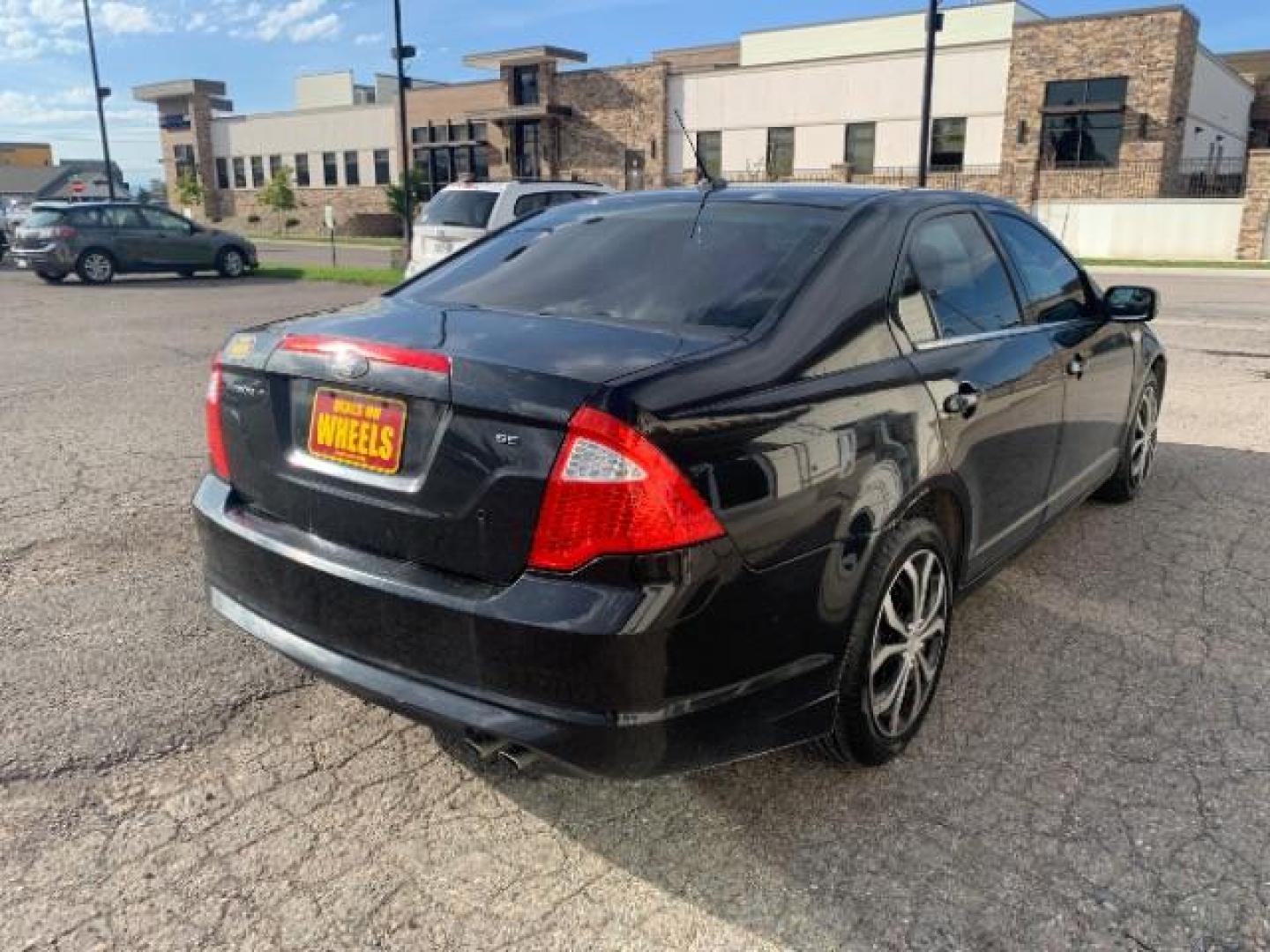 2011 Ford Fusion I4 SE (3FAHP0HA4BR) with an 2.5L L4 DOHC 16V engine, located at 1800 West Broadway, Missoula, 59808, (406) 543-1986, 46.881348, -114.023628 - Photo#3