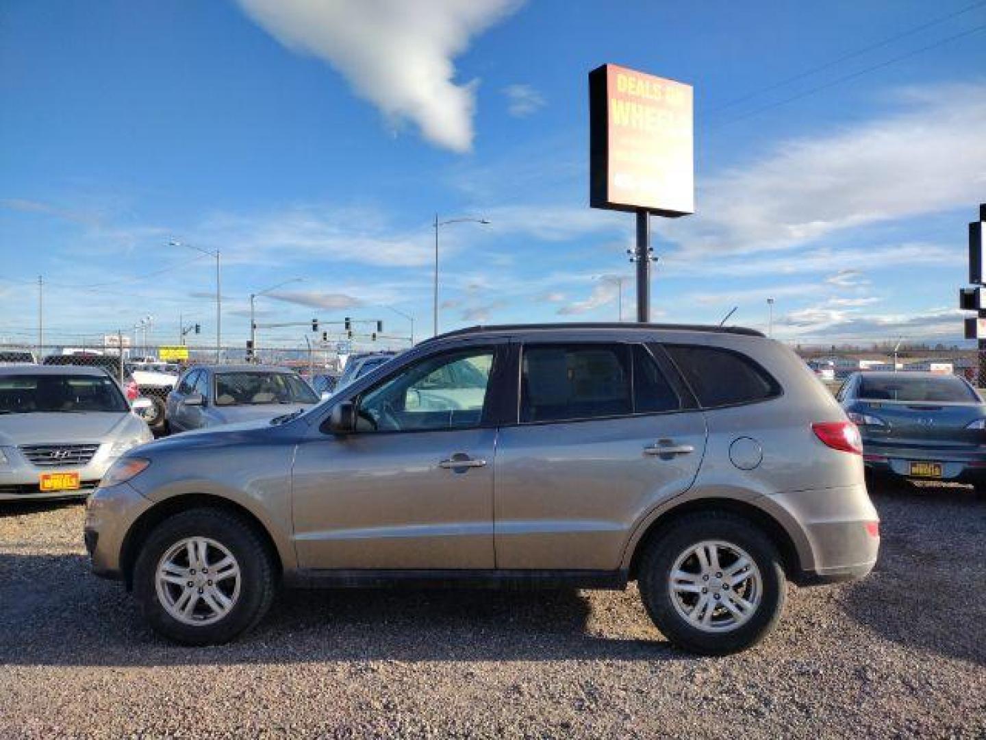 2011 Hyundai Santa Fe GLS 3.5 FWD (5XYZG4AG0BG) with an 3.5L V6 DOHC 24V engine, 6-Speed Automatic transmission, located at 4801 10th Ave S,, Great Falls, MT, 59405, 0.000000, 0.000000 - Photo#1