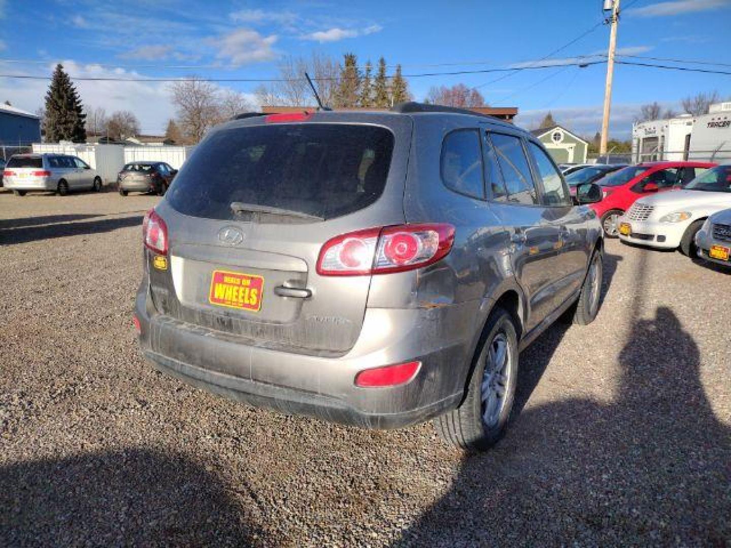 2011 Hyundai Santa Fe GLS 3.5 FWD (5XYZG4AG0BG) with an 3.5L V6 DOHC 24V engine, 6-Speed Automatic transmission, located at 4801 10th Ave S,, Great Falls, MT, 59405, 0.000000, 0.000000 - Photo#4