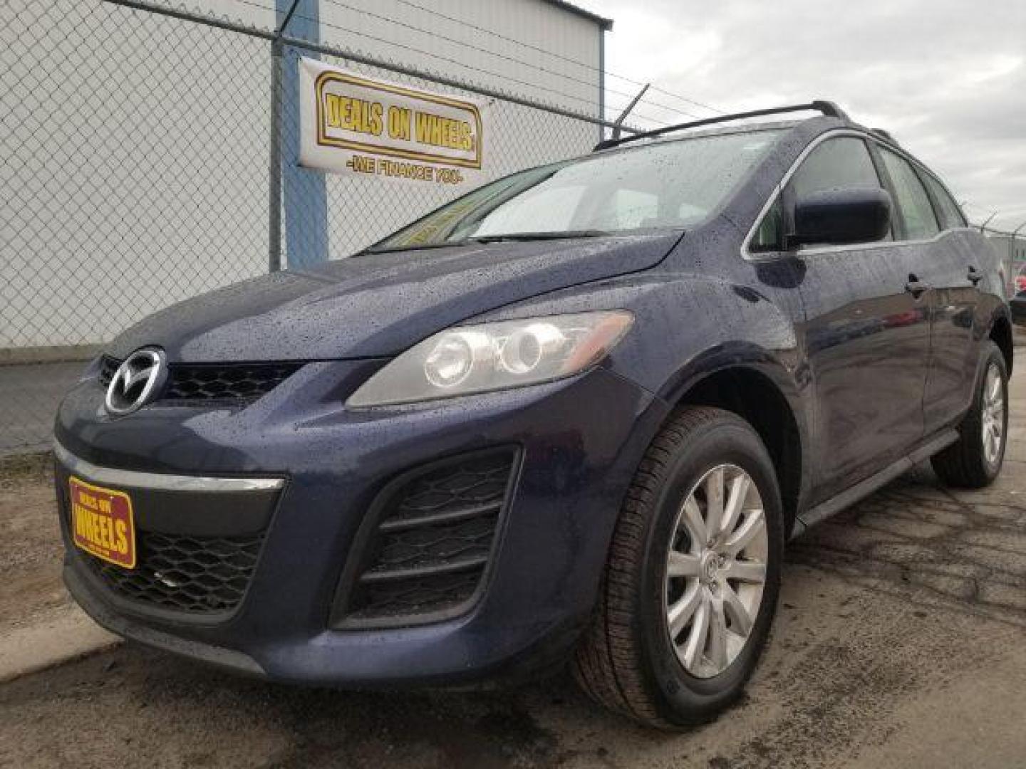 2011 Mazda CX-7 i SV (JM3ER2AM2B0) with an 2.5L L4 DOHC 16V engine, 5-Speed Automatic transmission, located at 601 E. Idaho St., Kalispell, MT, 59901, (406) 300-4664, 0.000000, 0.000000 - Photo#0