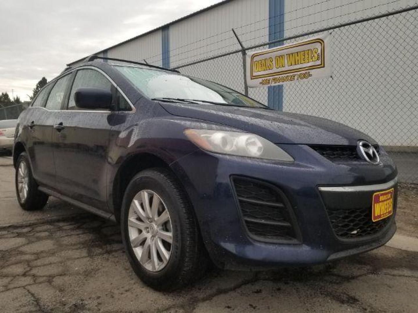 2011 Mazda CX-7 i SV (JM3ER2AM2B0) with an 2.5L L4 DOHC 16V engine, 5-Speed Automatic transmission, located at 601 E. Idaho St., Kalispell, MT, 59901, (406) 300-4664, 0.000000, 0.000000 - Photo#2