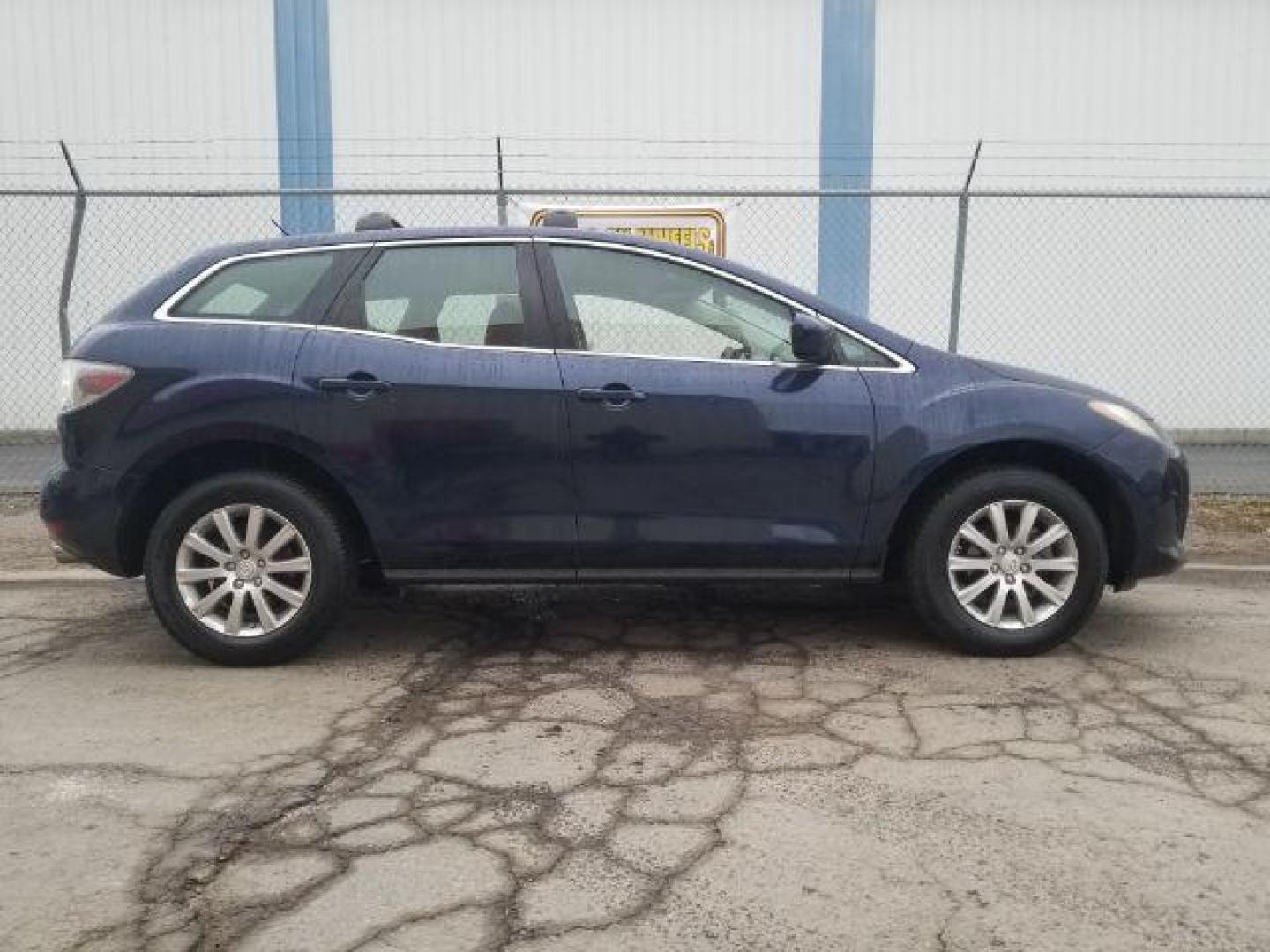 2011 Mazda CX-7 i SV (JM3ER2AM2B0) with an 2.5L L4 DOHC 16V engine, 5-Speed Automatic transmission, located at 601 E. Idaho St., Kalispell, MT, 59901, (406) 300-4664, 0.000000, 0.000000 - Photo#3