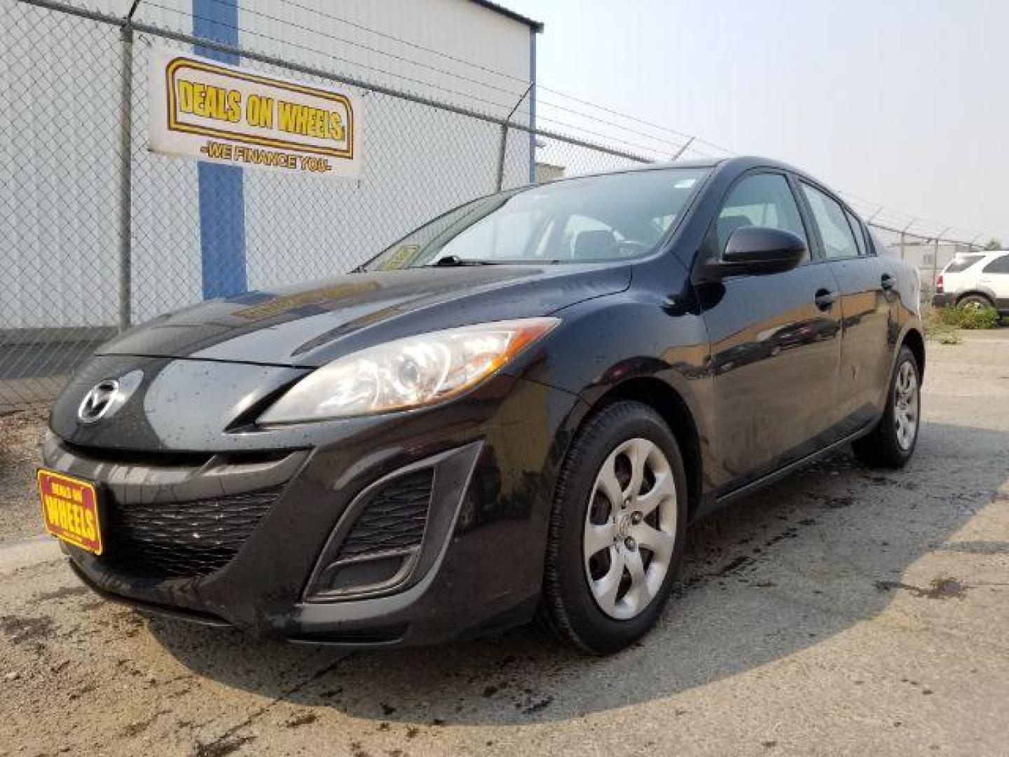 2011 Black Mica Mazda MAZDA3 i Sport 4-Door (JM1BL1UG6B1) with an 2.0L L4 DOHC 16V engine, located at 4801 10th Ave S,, Great Falls, MT, 59405, 0.000000, 0.000000 - Photo#0