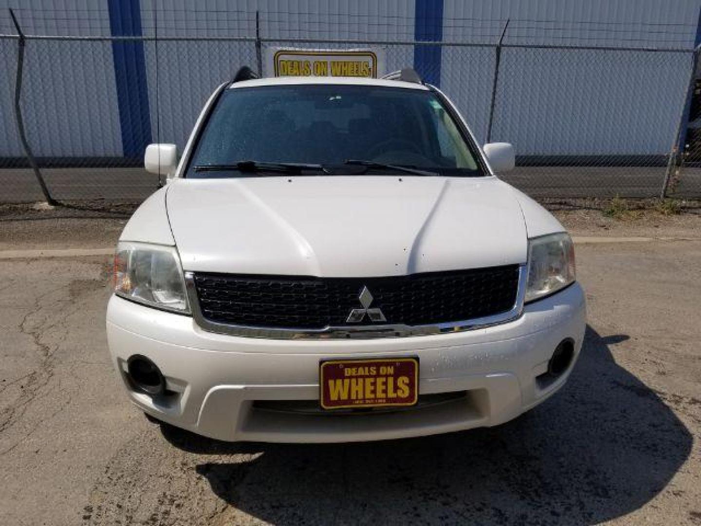 2011 Mitsubishi Endeavor LS AWD (4A4JN2AS9BE) with an 3.8L V6 SOHC 24V engine, 4-Speed Automatic transmission, located at 4047 Montana Ave., Billings, MT, 59101, 45.770847, -108.529800 - Photo#1