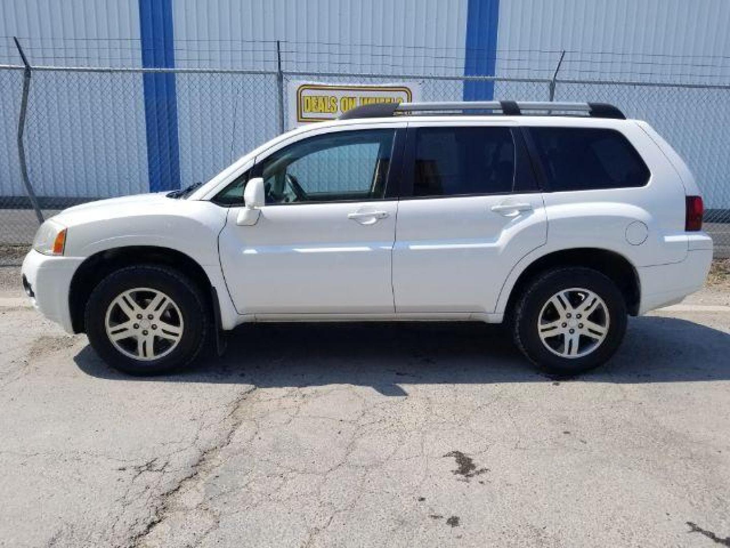 2011 Mitsubishi Endeavor LS AWD (4A4JN2AS9BE) with an 3.8L V6 SOHC 24V engine, 4-Speed Automatic transmission, located at 4047 Montana Ave., Billings, MT, 59101, 45.770847, -108.529800 - Photo#2