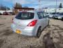 2011 Nissan Versa 1.8 SL Hatchback (3N1BC1CP9BL) with an 1.8L L4 DOHC 16V engine, 6 Speed Manual Trans transmission, located at 4801 10th Ave S,, Great Falls, MT, 59405, 0.000000, 0.000000 - Photo#4