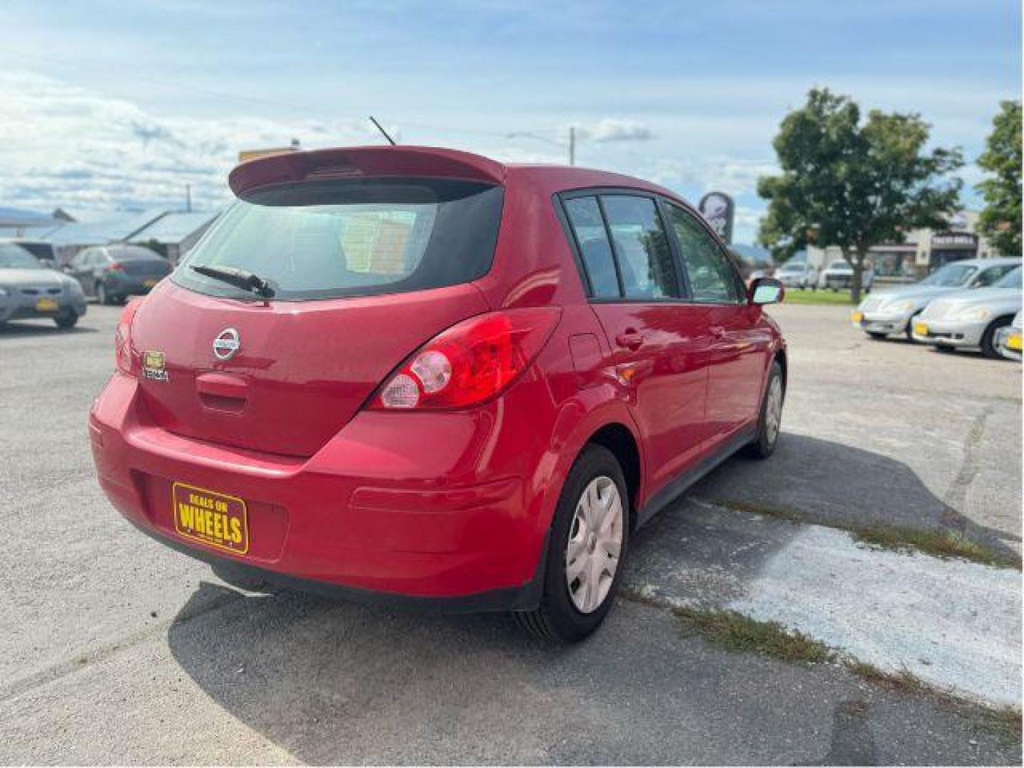 2011 Nissan Versa 1.8 SL Hatchback (3N1BC1CP0BL) with an 1.8L L4 DOHC 16V engine, Continuously Variable Transmission transmission, located at 601 E. Idaho St., Kalispell, MT, 59901, (406) 300-4664, 0.000000, 0.000000 - Photo#3