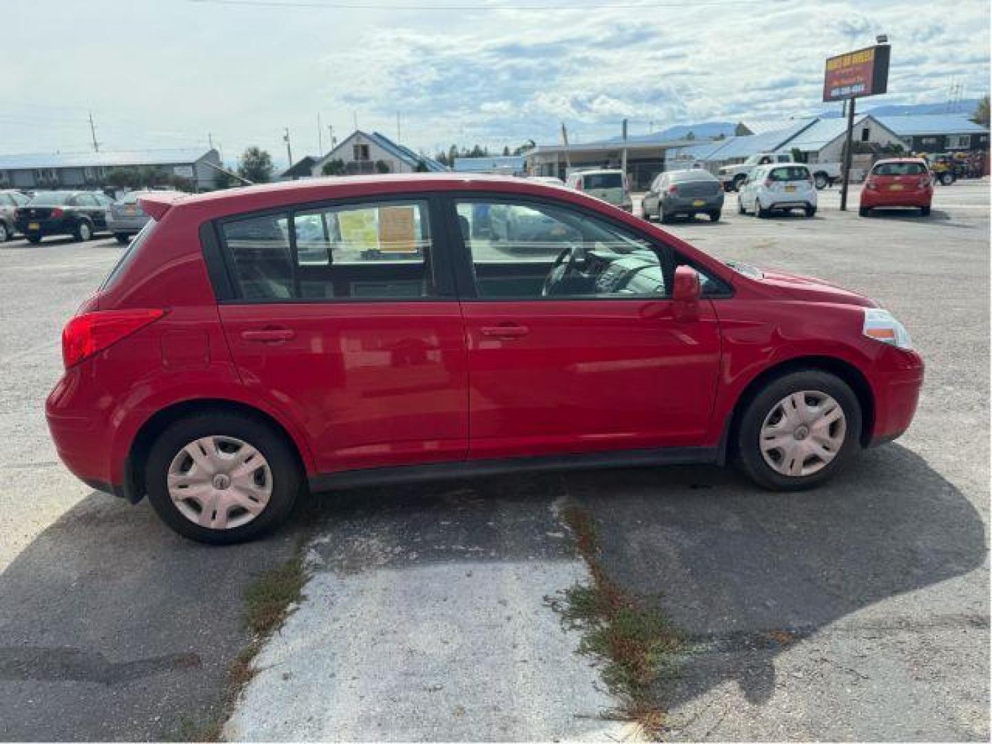 2011 Nissan Versa 1.8 SL Hatchback (3N1BC1CP0BL) with an 1.8L L4 DOHC 16V engine, Continuously Variable Transmission transmission, located at 601 E. Idaho St., Kalispell, MT, 59901, (406) 300-4664, 0.000000, 0.000000 - Photo#4