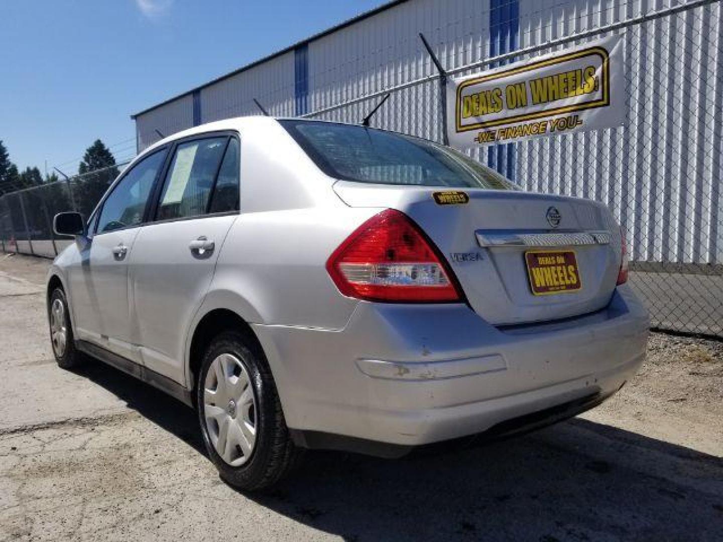 2011 Nissan Versa 1.8 S Sedan (3N1BC1AP7BL) with an 1.8L L4 DOHC 16V engine, located at 601 E. Idaho St., Kalispell, MT, 59901, (406) 300-4664, 0.000000, 0.000000 - Photo#3