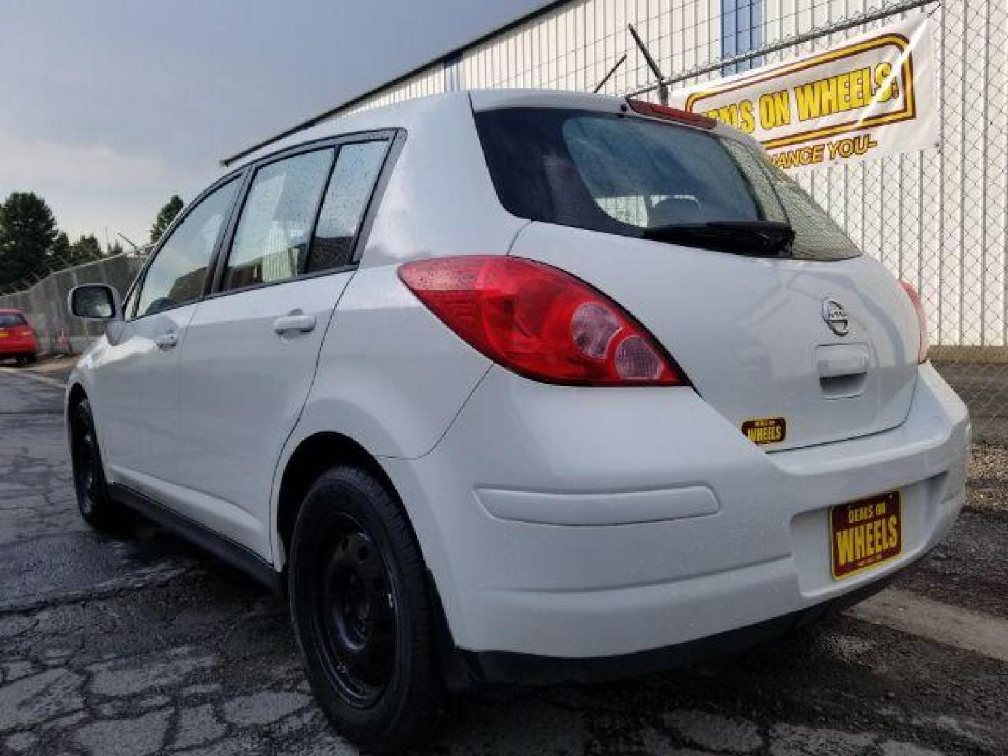 2011 Nissan Versa 1.8 SL Hatchback (3N1BC1CP2BL) with an 1.8L L4 DOHC 16V engine, Continuously Variable Transmission transmission, located at 1800 West Broadway, Missoula, 59808, (406) 543-1986, 46.881348, -114.023628 - Photo#3