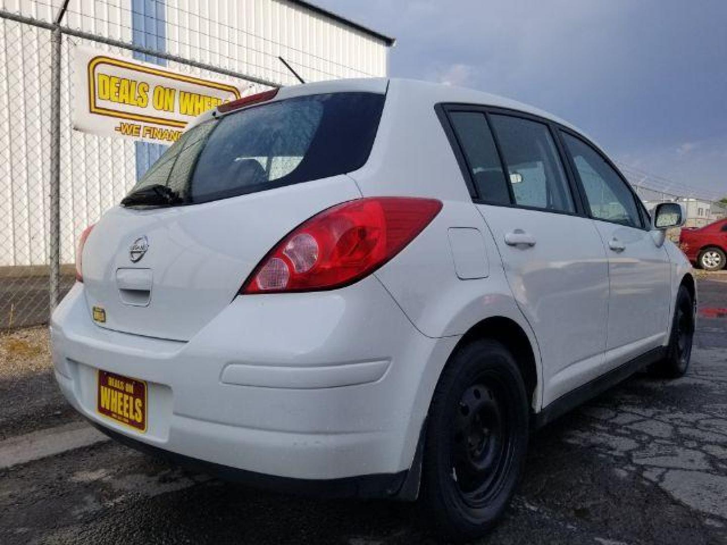 2011 Nissan Versa 1.8 SL Hatchback (3N1BC1CP2BL) with an 1.8L L4 DOHC 16V engine, Continuously Variable Transmission transmission, located at 1800 West Broadway, Missoula, 59808, (406) 543-1986, 46.881348, -114.023628 - Photo#4