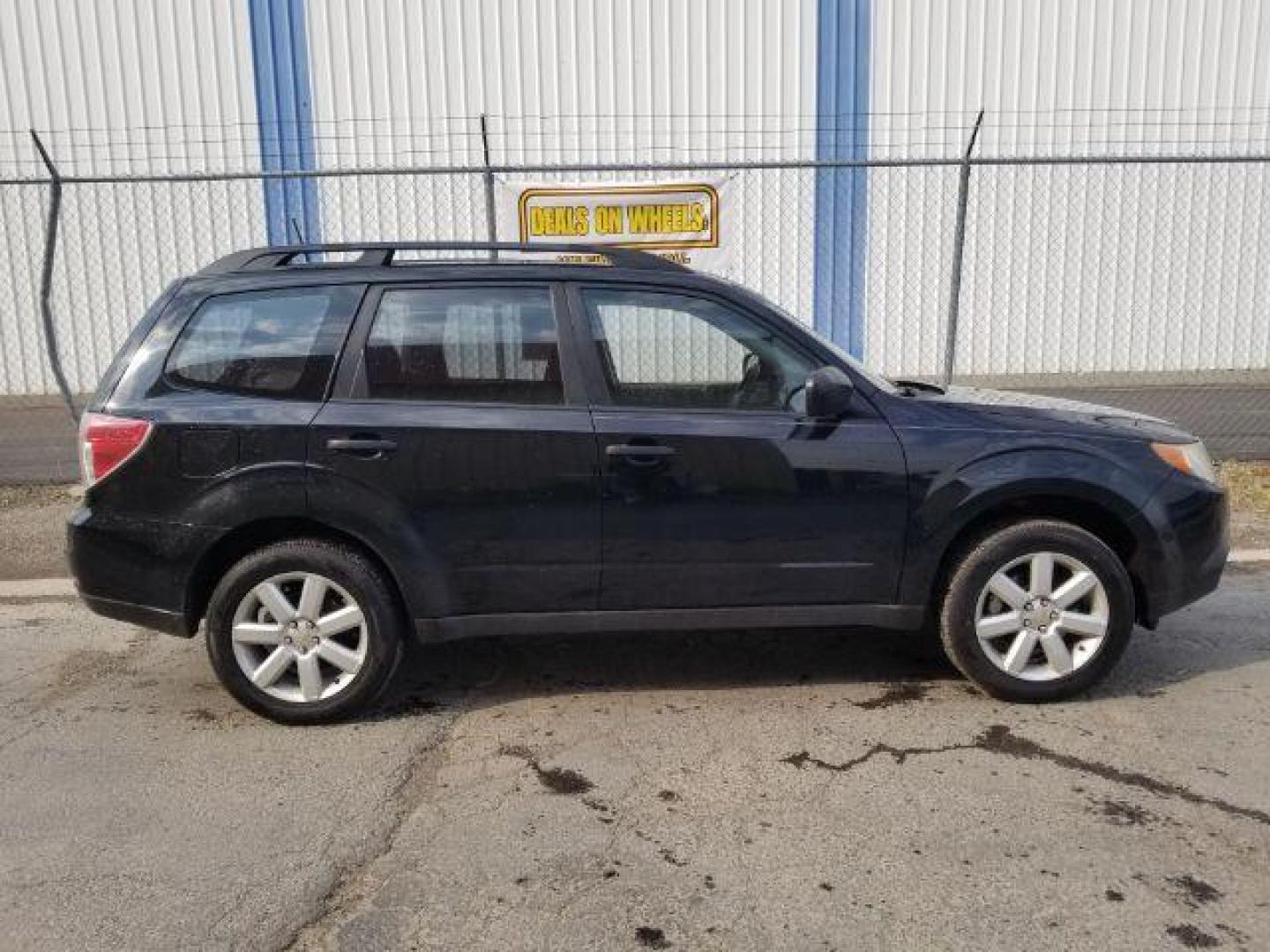 2011 Subaru Forester 2.5X Touring (JF2SHABC4BH) with an 2.5L H4 SOHC 16V engine, 4-Speed Automatic transmission, located at 4047 Montana Ave., Billings, MT, 59101, 45.770847, -108.529800 - Photo#6