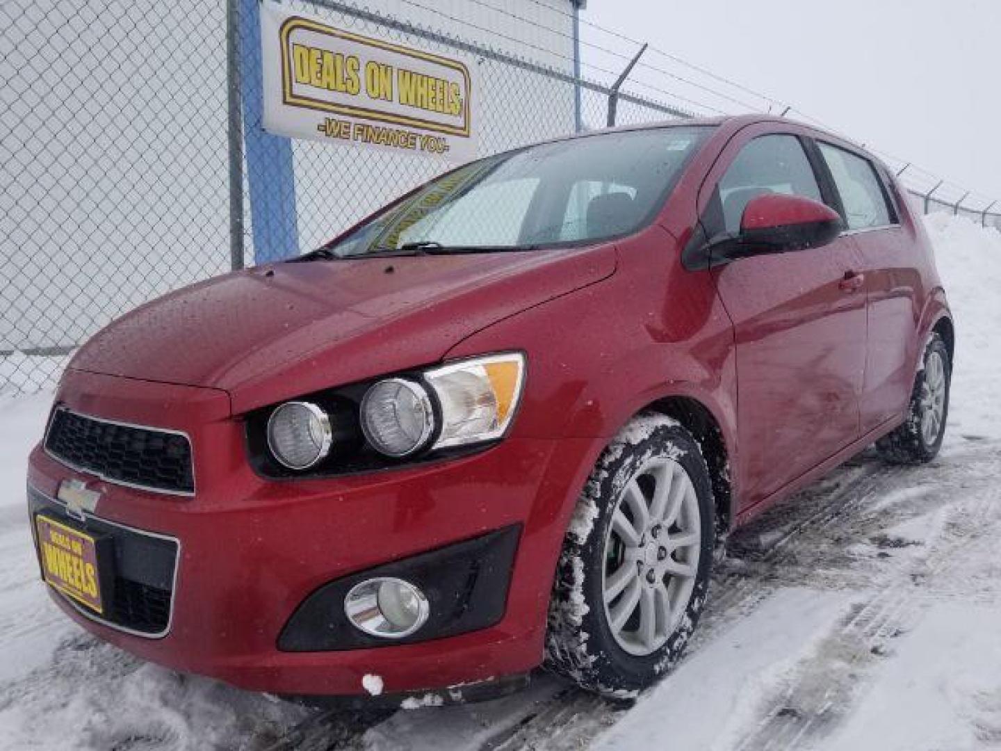 2012 Chevrolet Sonic 2LT 5-Door (1G1JC6SHXC4) with an 1.8L L4 DOHC 24V engine, 6-Speed Automatic transmission, located at 4047 Montana Ave., Billings, MT, 59101, 45.770847, -108.529800 - Photo#0