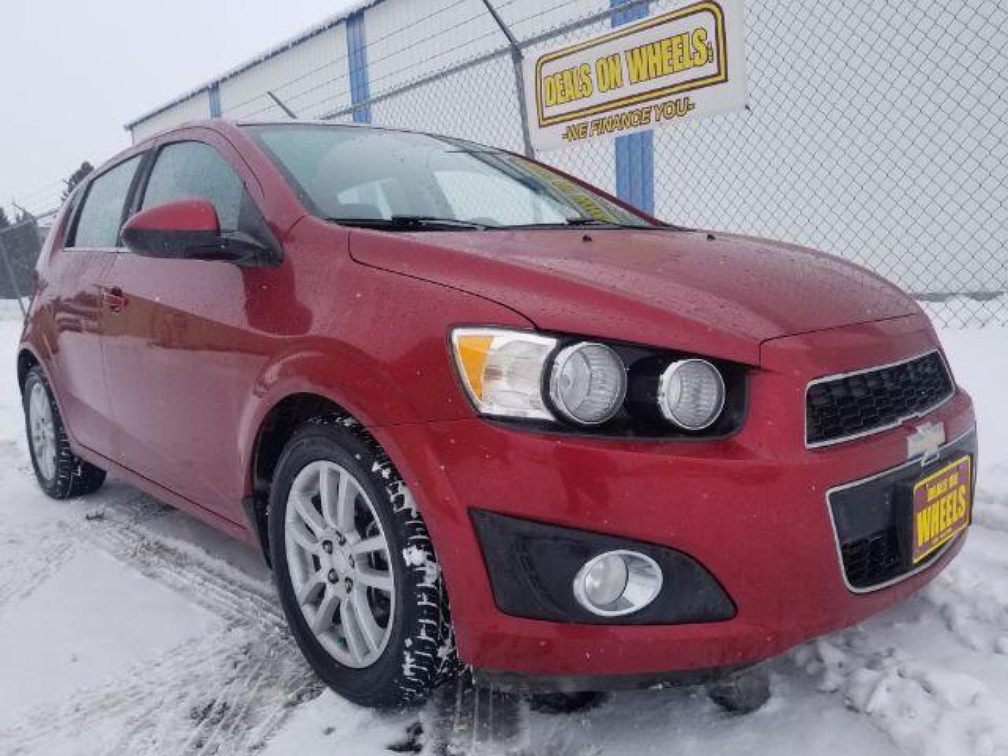 2012 Chevrolet Sonic 2LT 5-Door (1G1JC6SHXC4) with an 1.8L L4 DOHC 24V engine, 6-Speed Automatic transmission, located at 4047 Montana Ave., Billings, MT, 59101, 45.770847, -108.529800 - Photo#2