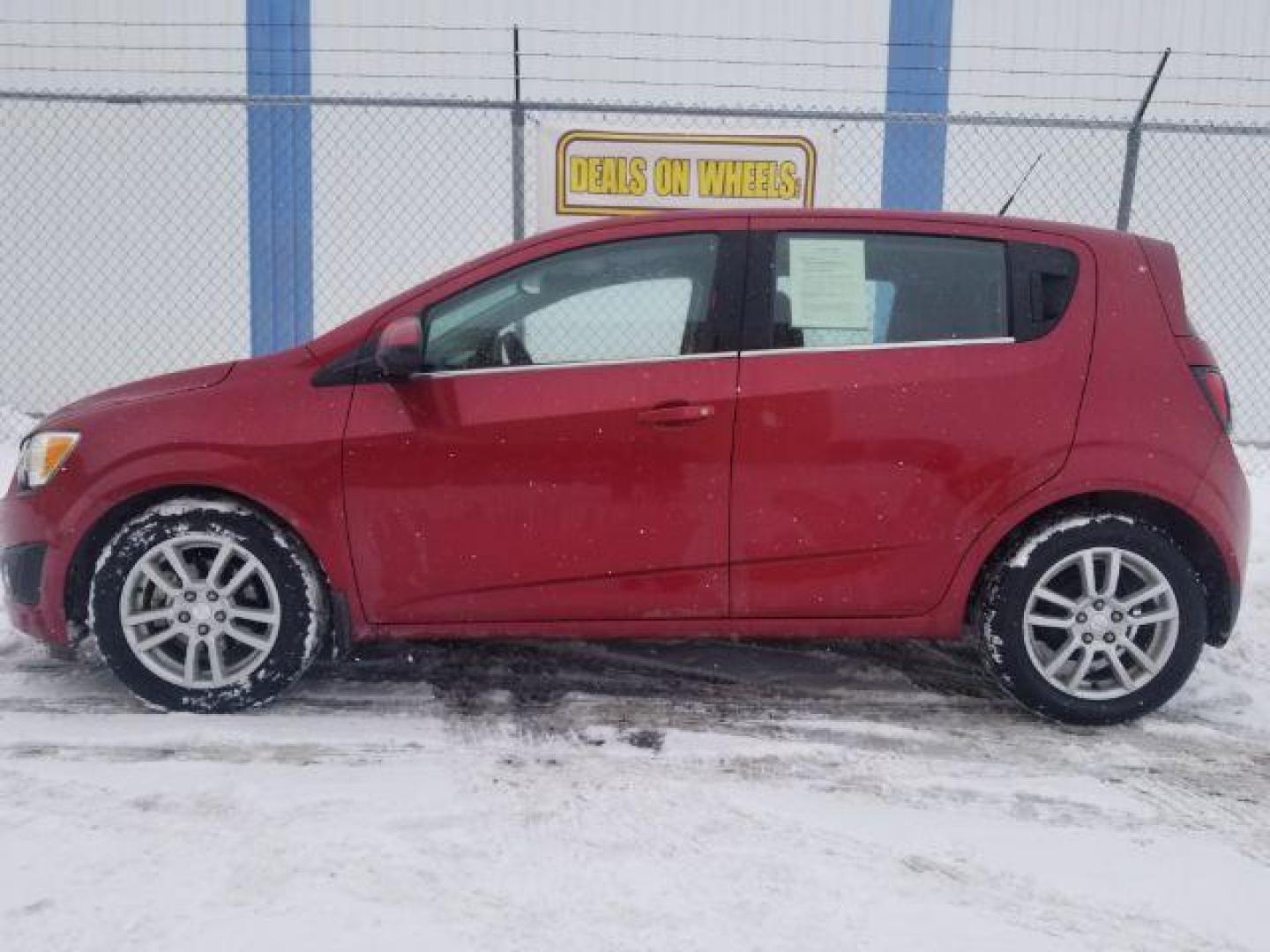 2012 Chevrolet Sonic 2LT 5-Door (1G1JC6SHXC4) with an 1.8L L4 DOHC 24V engine, 6-Speed Automatic transmission, located at 4047 Montana Ave., Billings, MT, 59101, 45.770847, -108.529800 - Photo#6