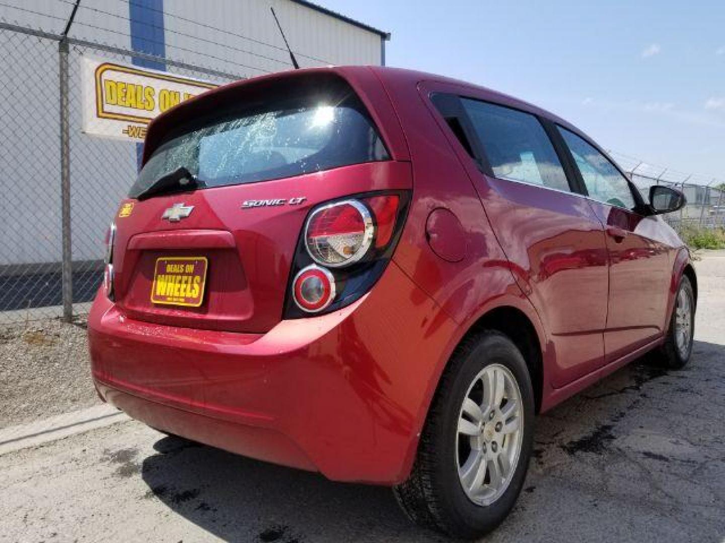 2012 Chevrolet Sonic 2LT 5-Door (1G1JC6SH6C4) with an 1.8L L4 DOHC 24V engine, 6-Speed Automatic transmission, located at 4801 10th Ave S,, Great Falls, MT, 59405, 0.000000, 0.000000 - Photo#4