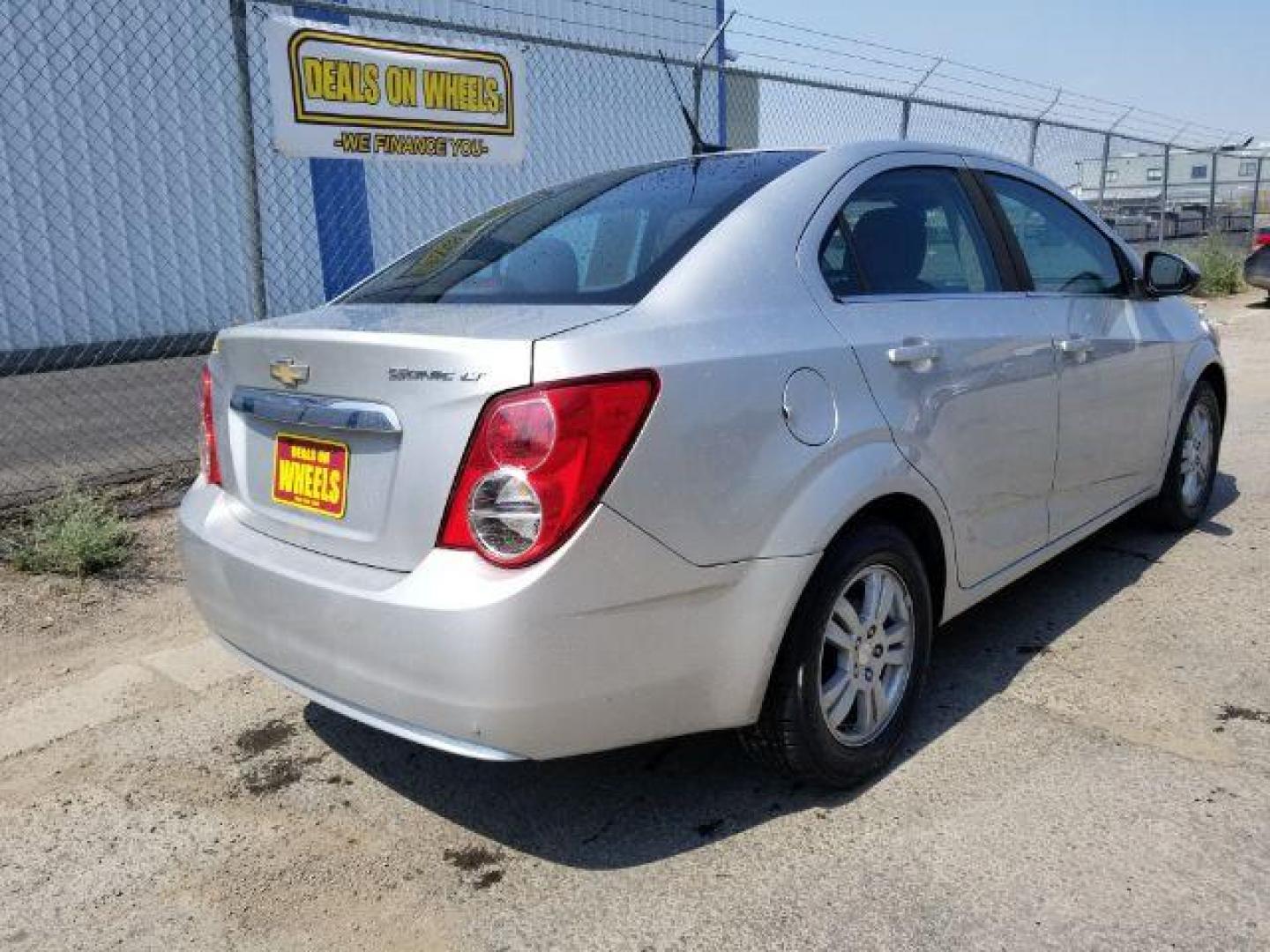 2012 Chevrolet Sonic 2LT Sedan (1G1JC5SH6C4) with an 1.8L L4 DOHC 24V engine, 6-Speed Automatic transmission, located at 601 E. Idaho St., Kalispell, MT, 59901, (406) 300-4664, 0.000000, 0.000000 - Photo#4