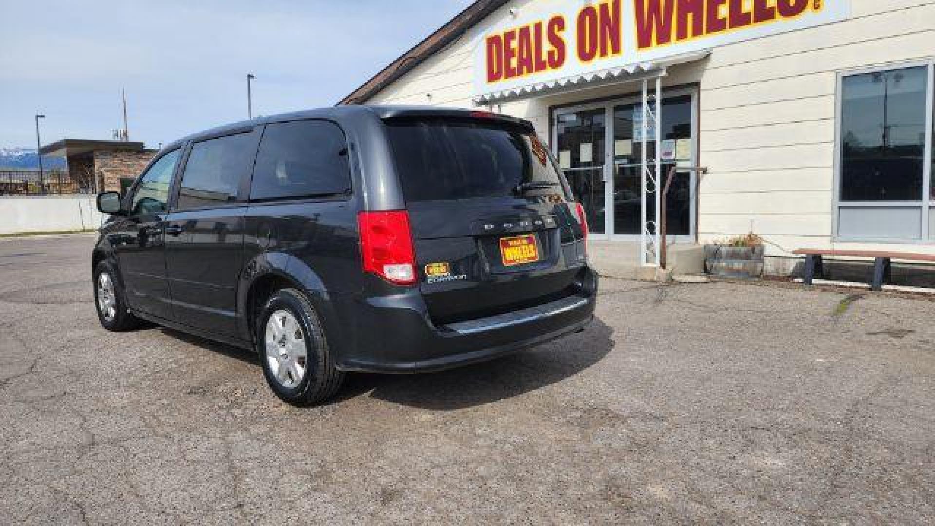 2012 Dark Charcoal Pearl Dodge Grand Caravan SE (2C4RDGBG9CR) with an 3.6L V6 DOHC 24V engine, 6-Speed Automatic transmission, located at 1800 West Broadway, Missoula, 59808, (406) 543-1986, 46.881348, -114.023628 - Photo#4