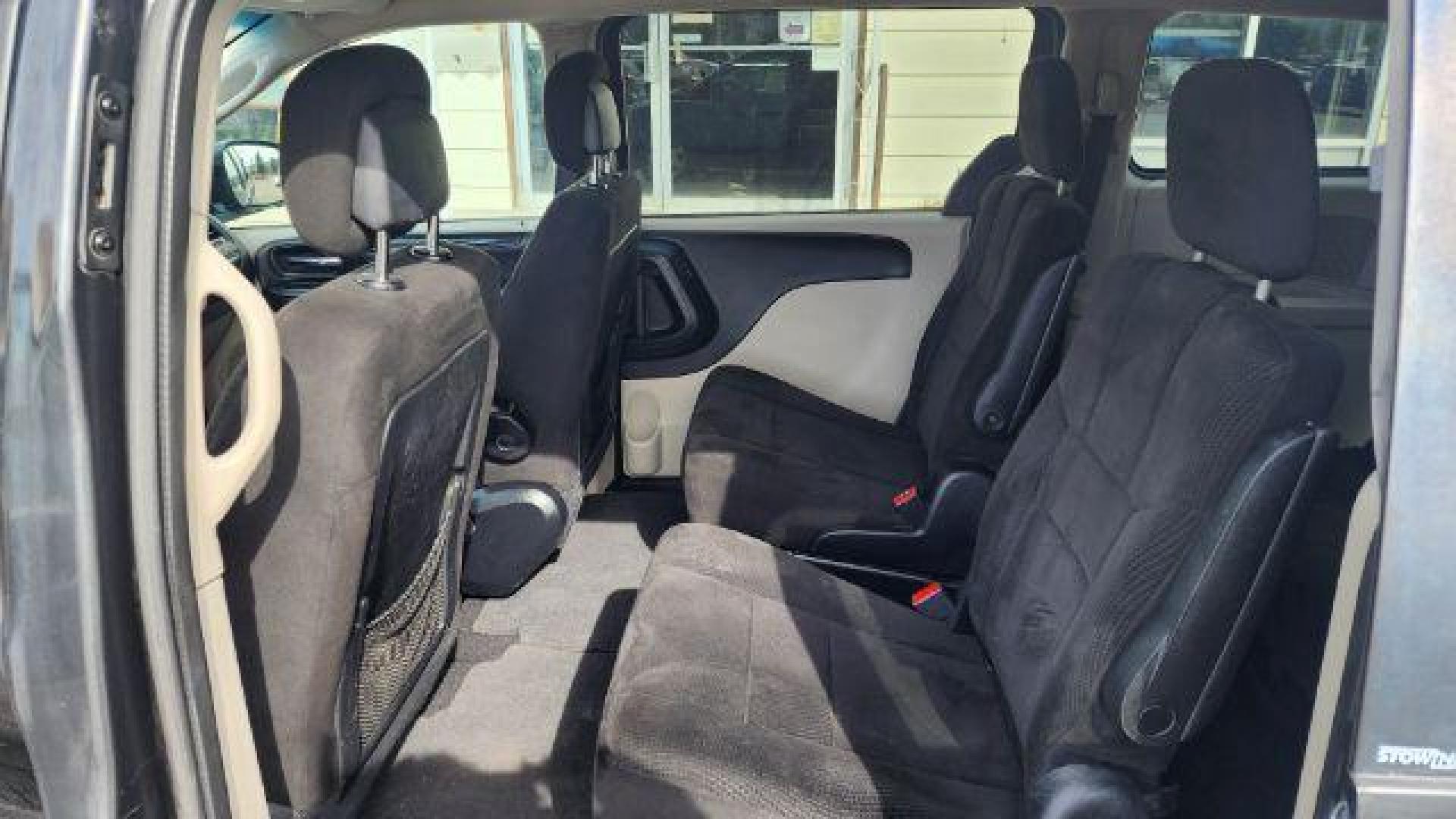 2012 Dark Charcoal Pearl Dodge Grand Caravan SE (2C4RDGBG9CR) with an 3.6L V6 DOHC 24V engine, 6-Speed Automatic transmission, located at 1800 West Broadway, Missoula, 59808, (406) 543-1986, 46.881348, -114.023628 - Photo#7