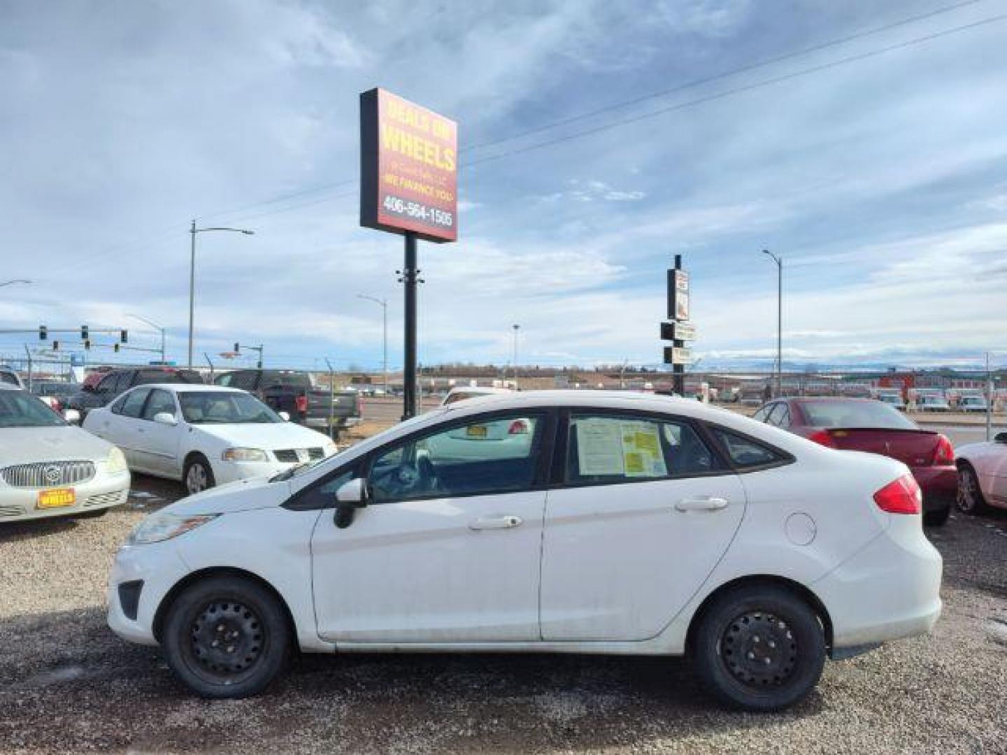 2012 Ford Fiesta SE Sedan (3FADP4BJ6CM) with an 1.6L L4 DOHC 16V engine, located at 4801 10th Ave S,, Great Falls, MT, 59405, 0.000000, 0.000000 - Photo#1