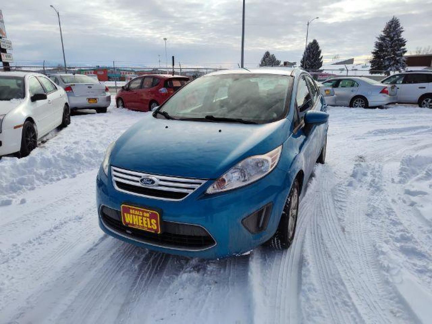 2012 Ford Fiesta SE Sedan (3FADP4BJ6CM) with an 1.6L L4 DOHC 16V engine, located at 4801 10th Ave S,, Great Falls, MT, 59405, 0.000000, 0.000000 - Photo#0