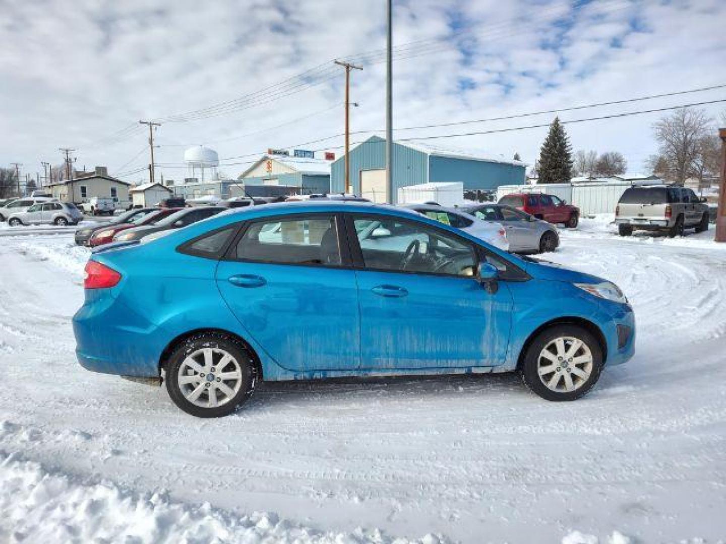 2012 Ford Fiesta SE Sedan (3FADP4BJ6CM) with an 1.6L L4 DOHC 16V engine, located at 4801 10th Ave S,, Great Falls, MT, 59405, 0.000000, 0.000000 - Photo#5