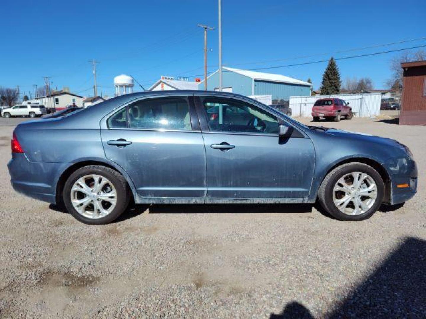 2012 Ford Fusion SE (3FAHP0HA0CR) with an 2.5L L4 DOHC 16V engine, located at 4801 10th Ave S,, Great Falls, MT, 59405, 0.000000, 0.000000 - Photo#5