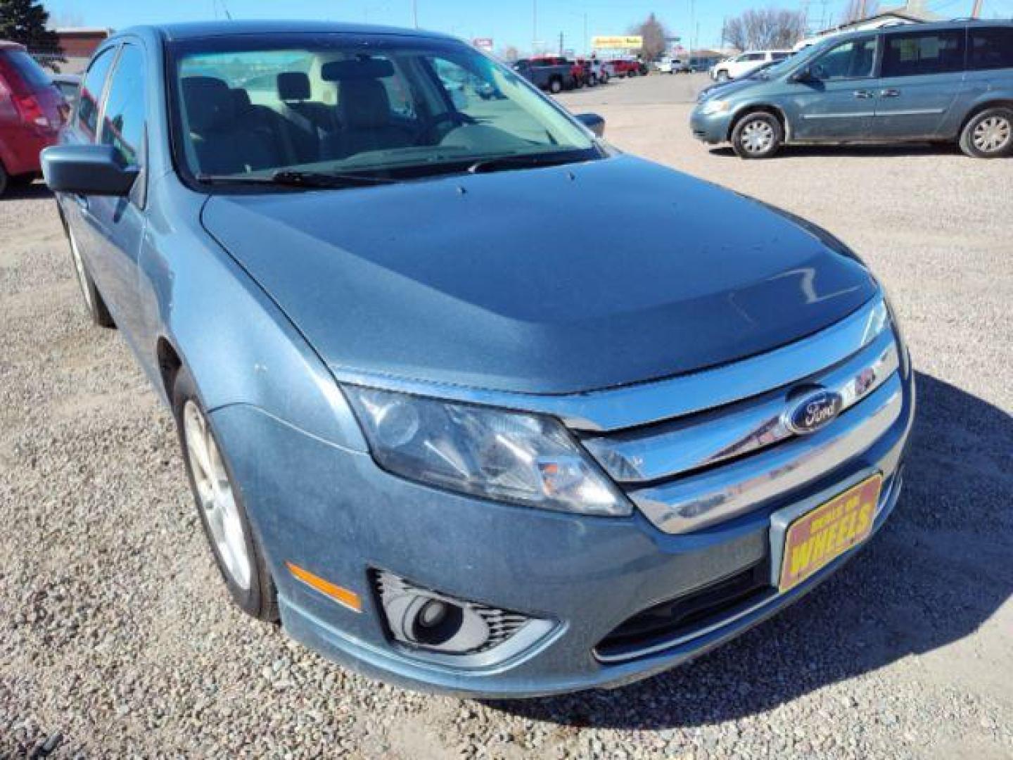 2012 Ford Fusion SE (3FAHP0HA0CR) with an 2.5L L4 DOHC 16V engine, located at 4801 10th Ave S,, Great Falls, MT, 59405, 0.000000, 0.000000 - Photo#6