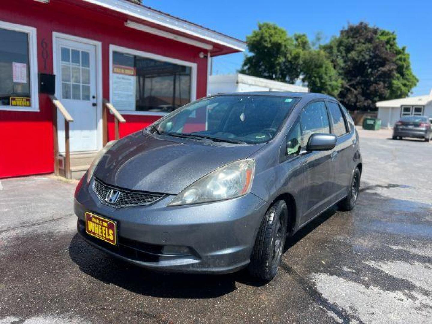 2012 Honda Fit 5-Speed MT (JHMGE8G34CC) with an 1.5L L4 SOHC 16V engine, 5-Speed Manual transmission, located at 601 E. Idaho St., Kalispell, MT, 59901, (406) 300-4664, 0.000000, 0.000000 - Photo#0