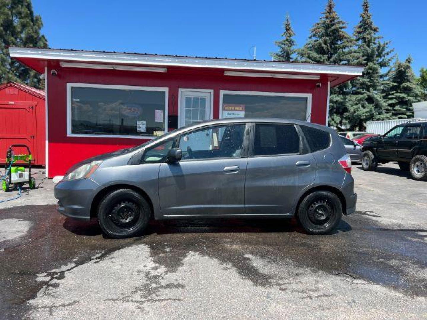 2012 Honda Fit 5-Speed MT (JHMGE8G34CC) with an 1.5L L4 SOHC 16V engine, 5-Speed Manual transmission, located at 601 E. Idaho St., Kalispell, MT, 59901, (406) 300-4664, 0.000000, 0.000000 - Photo#1