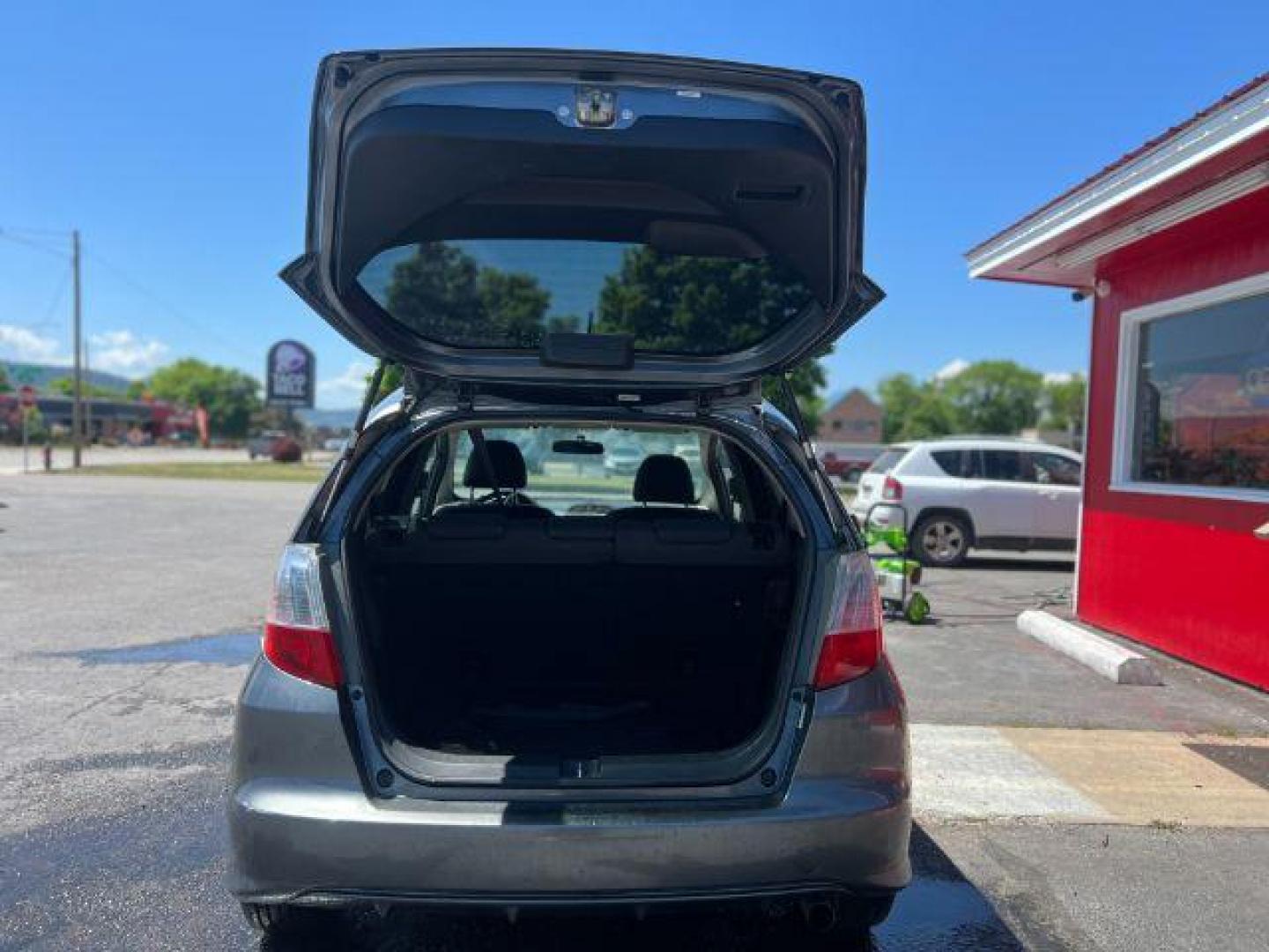 2012 Honda Fit 5-Speed MT (JHMGE8G34CC) with an 1.5L L4 SOHC 16V engine, 5-Speed Manual transmission, located at 601 E. Idaho St., Kalispell, MT, 59901, (406) 300-4664, 0.000000, 0.000000 - Photo#4