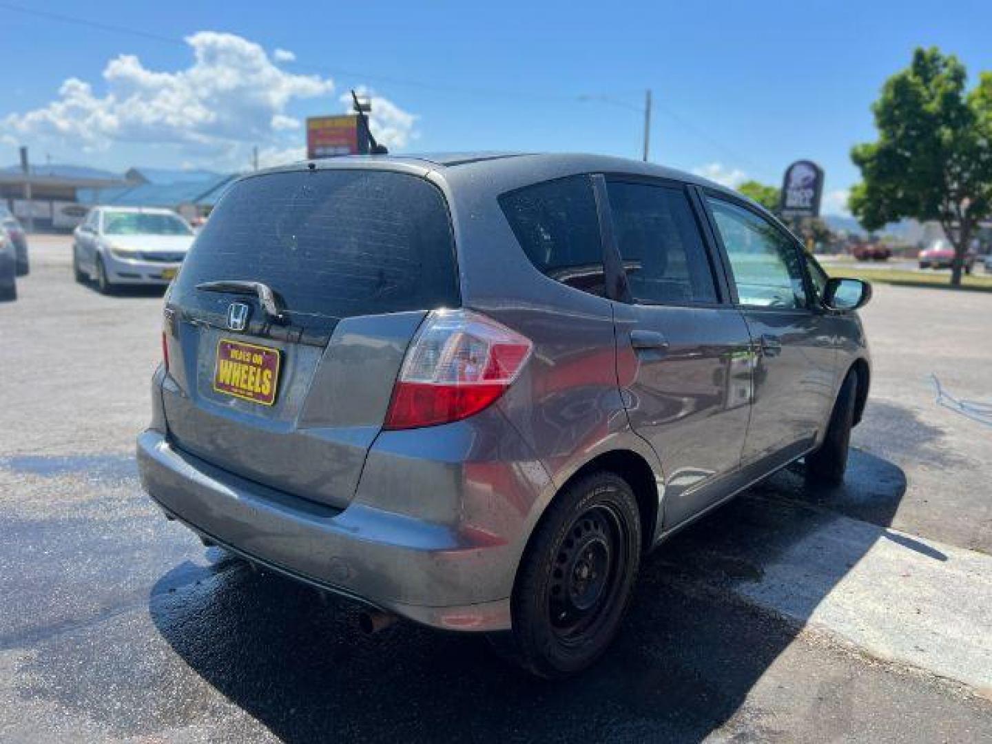 2012 Honda Fit 5-Speed MT (JHMGE8G34CC) with an 1.5L L4 SOHC 16V engine, 5-Speed Manual transmission, located at 601 E. Idaho St., Kalispell, MT, 59901, (406) 300-4664, 0.000000, 0.000000 - Photo#5